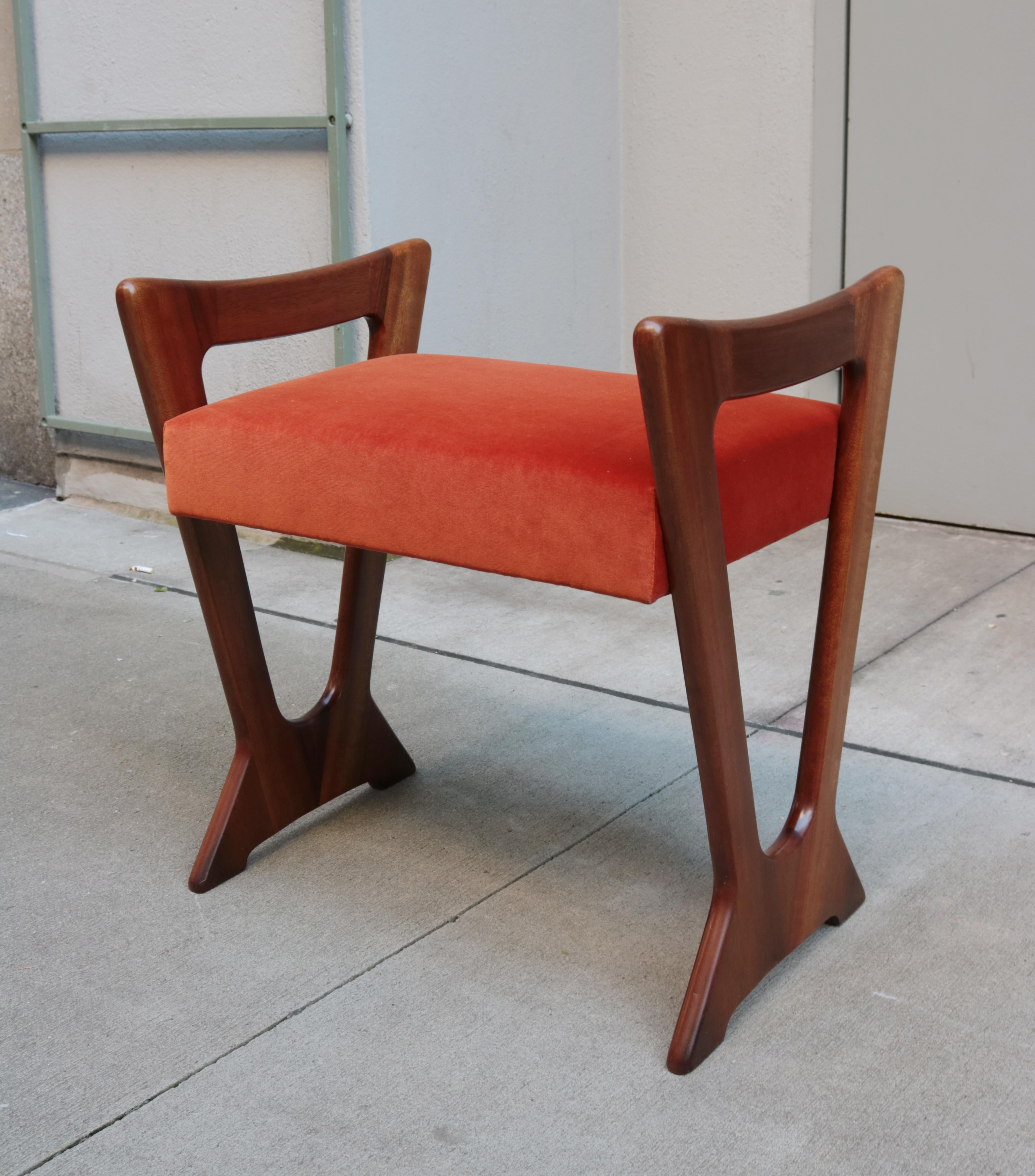 A pair of Italian Mid-Century Modern stools.
Mahogany legs.