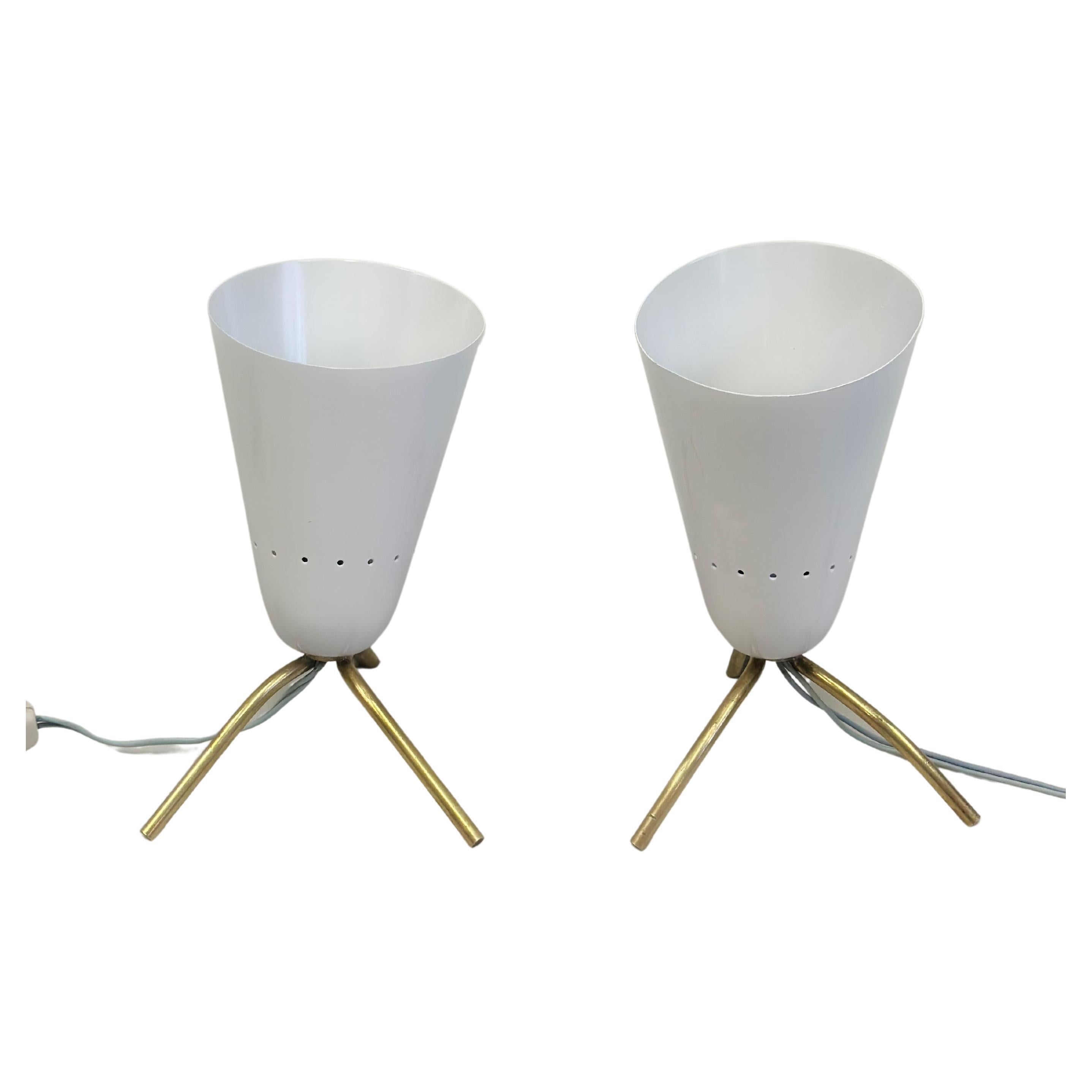 A Rare Pair of Italian Midcentury Modern Table or Desk or Bedside Lamps attributed to Gino Sarfatti for Arteluce, Italy, circa 1950. The lamps have an iconic design, lines, and forms and color palette. Both the bases and reflectors are angled: the