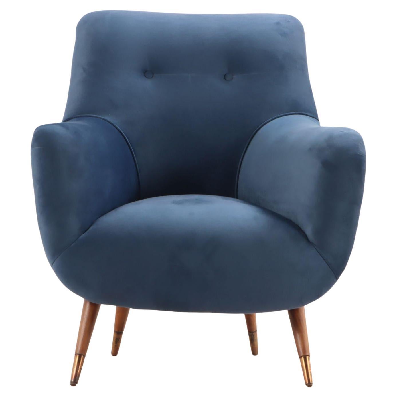 Pair of Italian mid-century modern upholstered club chairs c. 1950. Mid-century modern Italian club chairs are a stylish and iconic piece of furniture, renowned for their sleek lines and elegant design. They typically embody the minimalist and