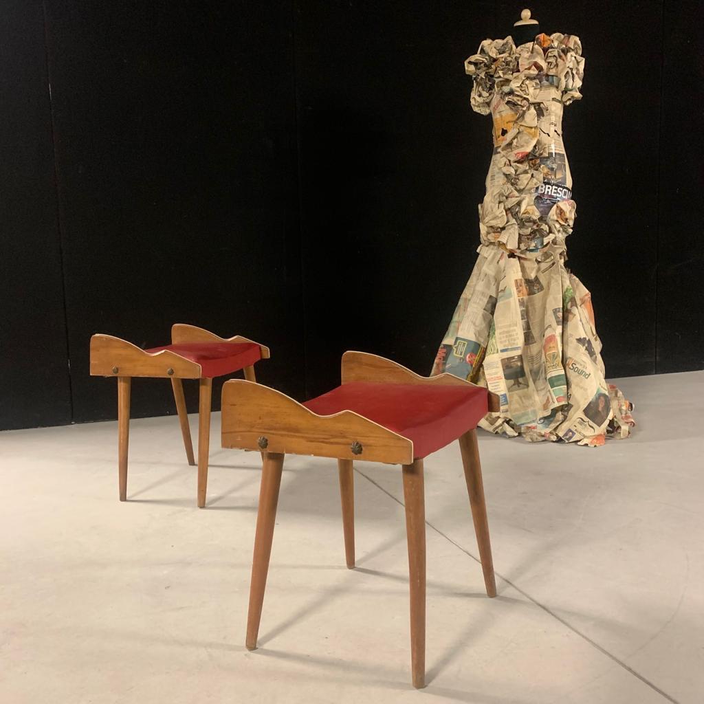 Rare pair of Italian Mid-Century Modern benches or stools attributed to Gio Ponti with hand cut wood side panels in a unique, organic form. The pieces are reflective of the work of Gio Ponti circa 1955 and, in particular his work at the Parco di