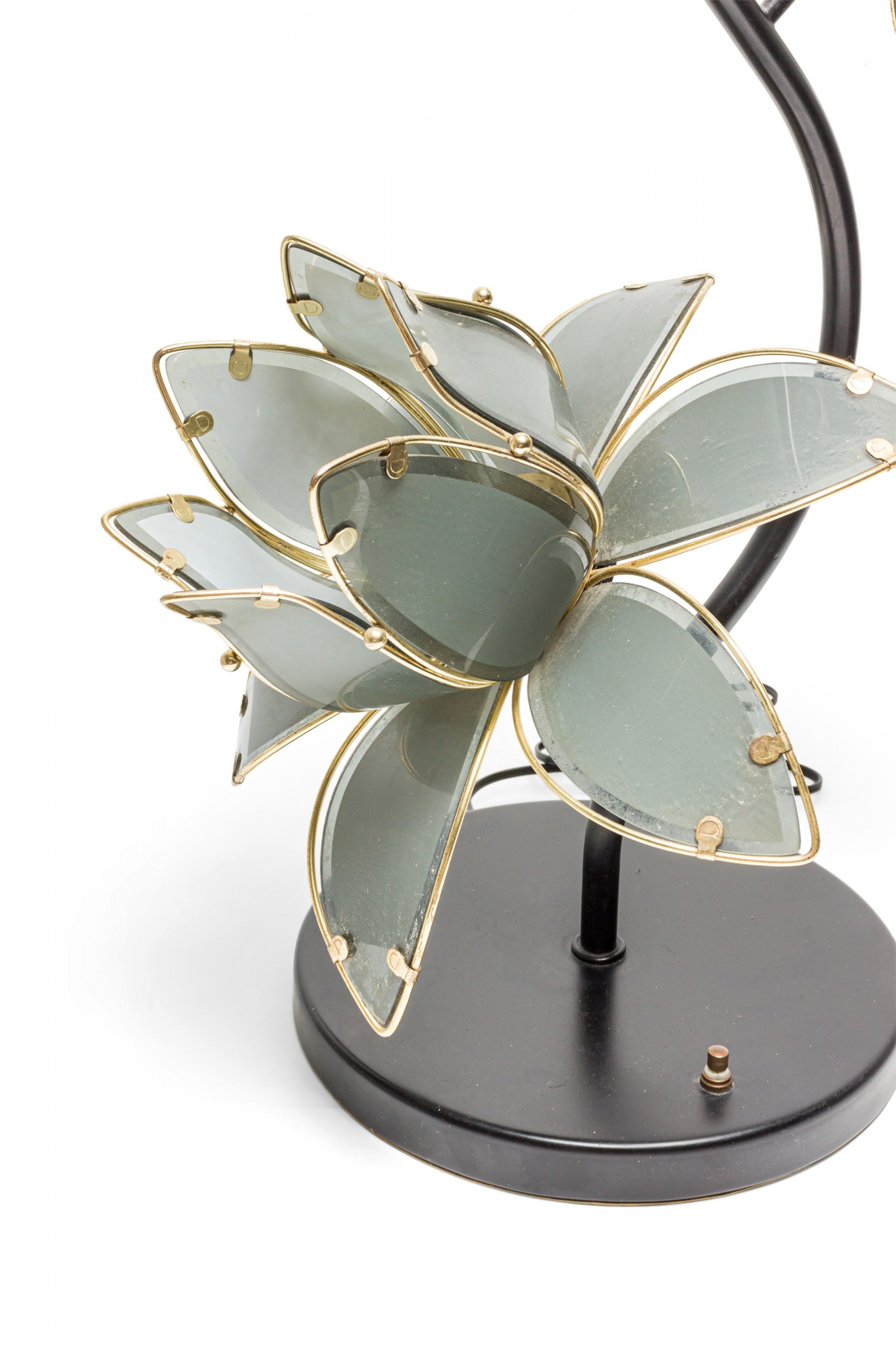 PAIR of Italian Mid-Century (1970s) table lamps with three large lotus flower-shaped lights with smoked glass petals suspended in brass frames, mounted to an S-curved central black metal post anchored on a weighted circular black metal base. (PRICED