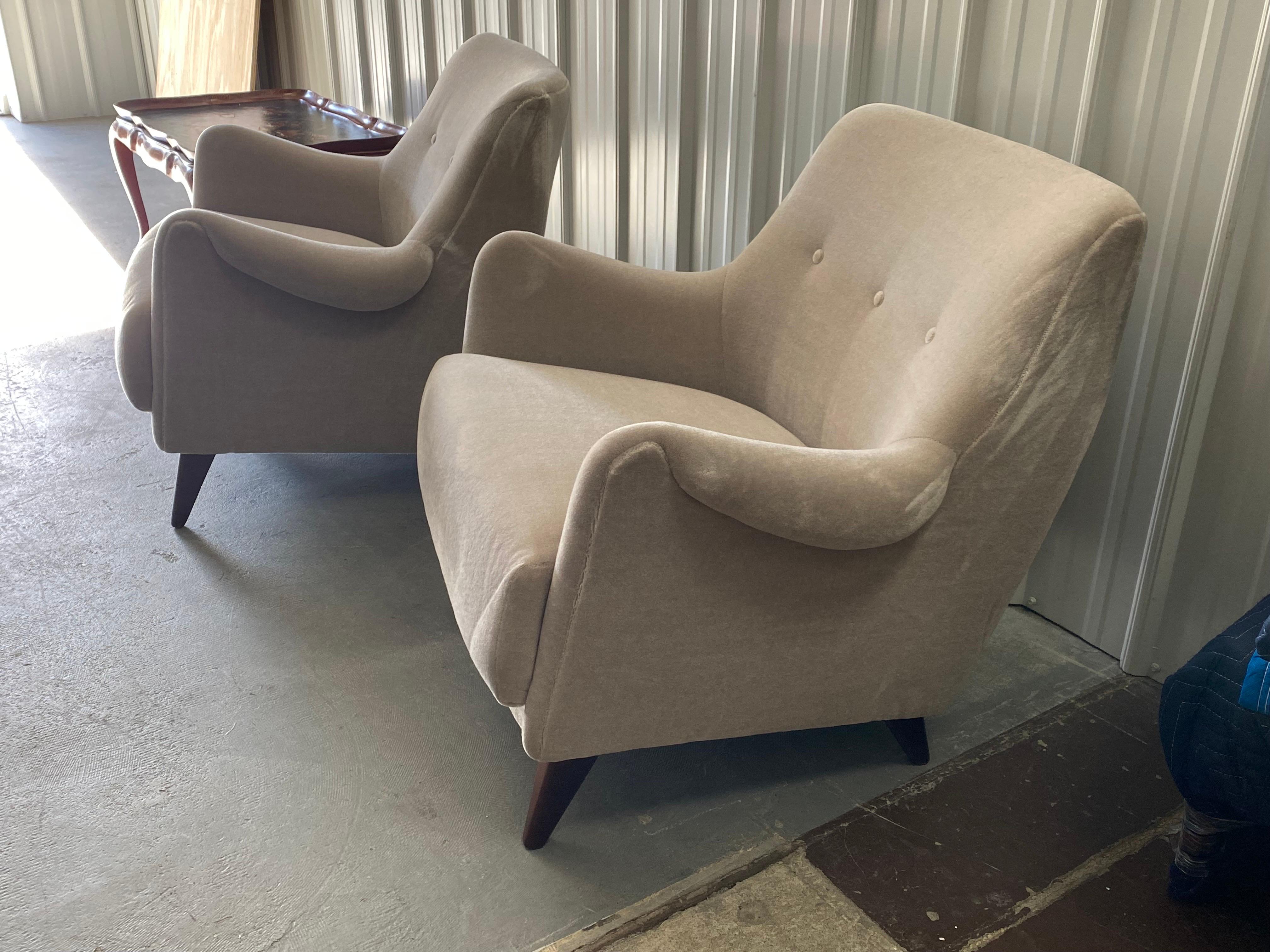 Pair of Italian Mid-Century Upholstered Mohair Armchairs.
A Ponti Augustus-esque stance but the arm is more Carl Malmsten. Designer unknown but these have all the right elements of a classic Mid-Century lounge chair.  Thought to be of Italian