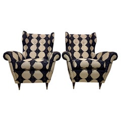 Paire de fauteuils à oreilles italiens du milieu du siècle, vers les années 1950