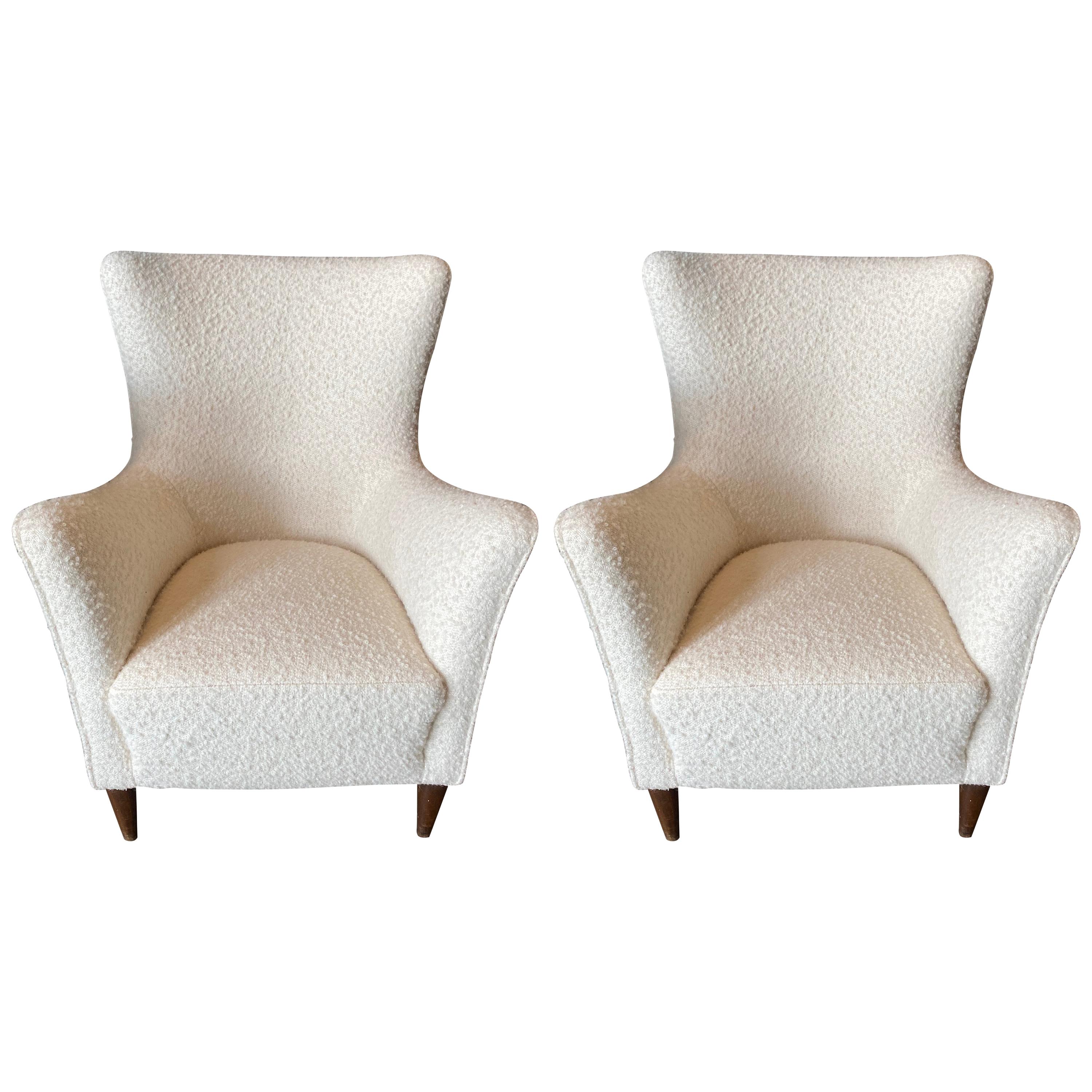 Pair of Italian Mid-Century Wingback Chairs in Creamy White Boucle For Sale