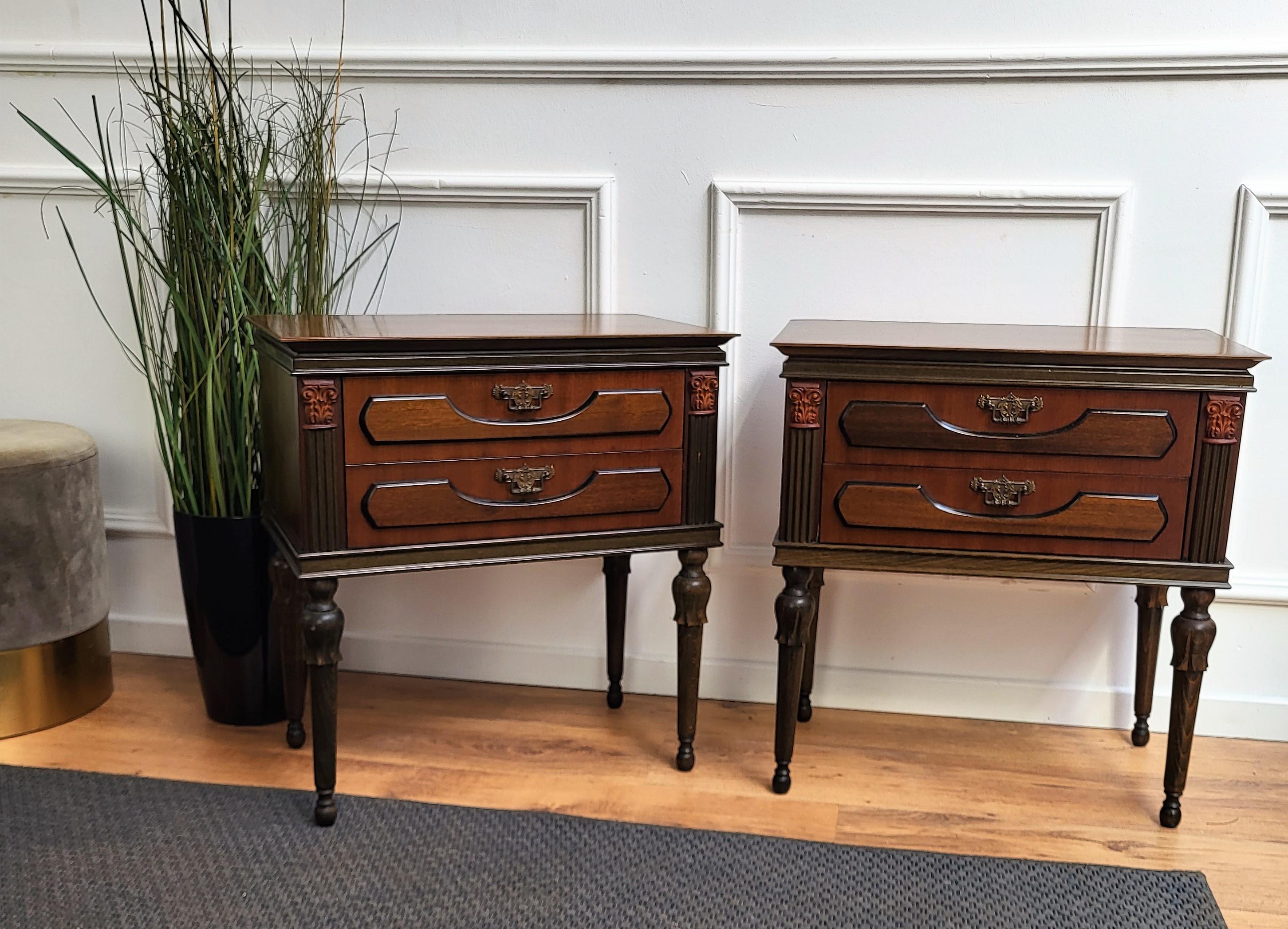 Very elegant and refined Italian 1960s neoclassical art deco pair of bedside tables with carved and decorated walnut and fruitwood, 2 drawers with carved legs. Those nightstands make a great look in any style bedroom, as a complementary design or as