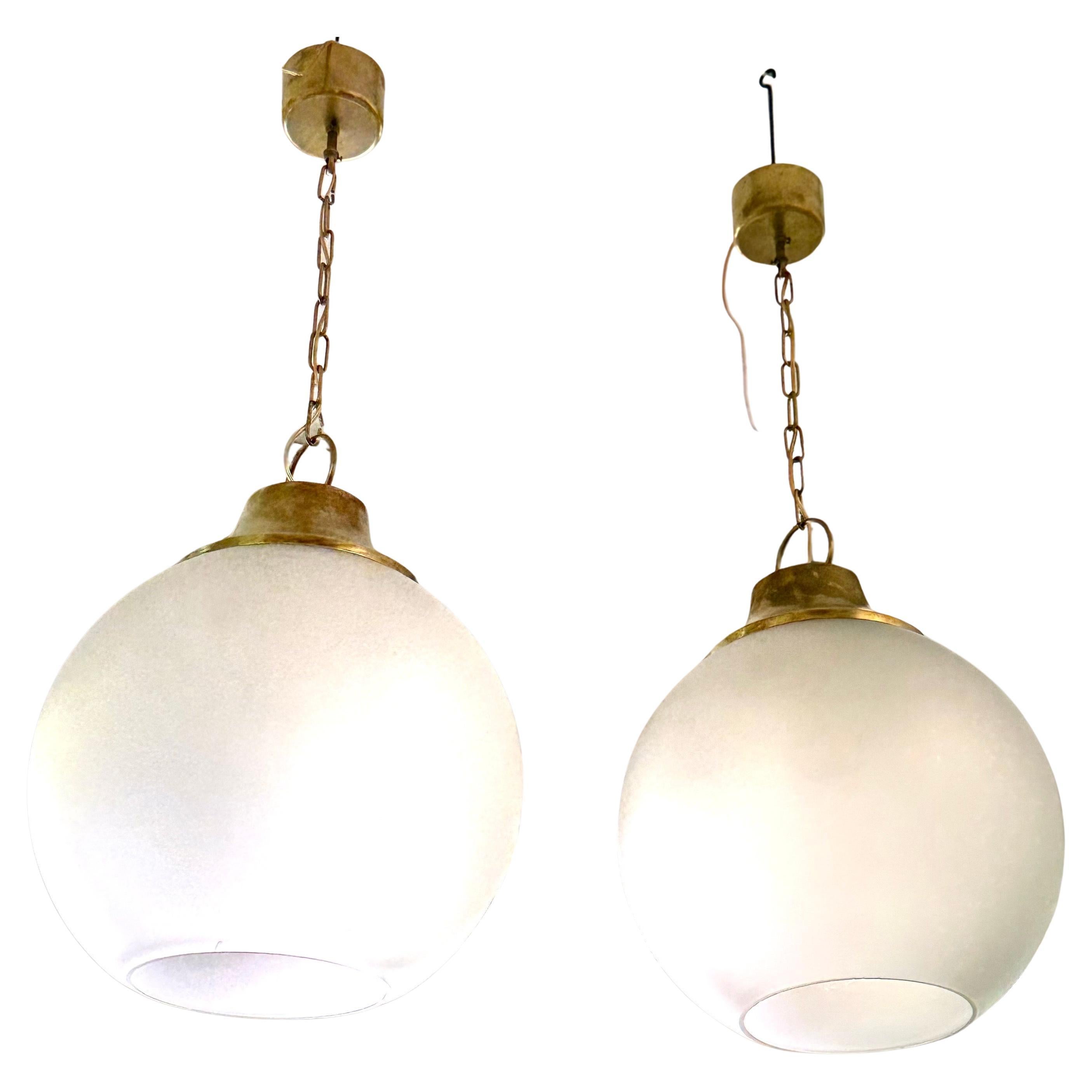 Pair of Italian Midcentury Brass & Satin Glass Ball Pendants by Caccia Dominioni For Sale