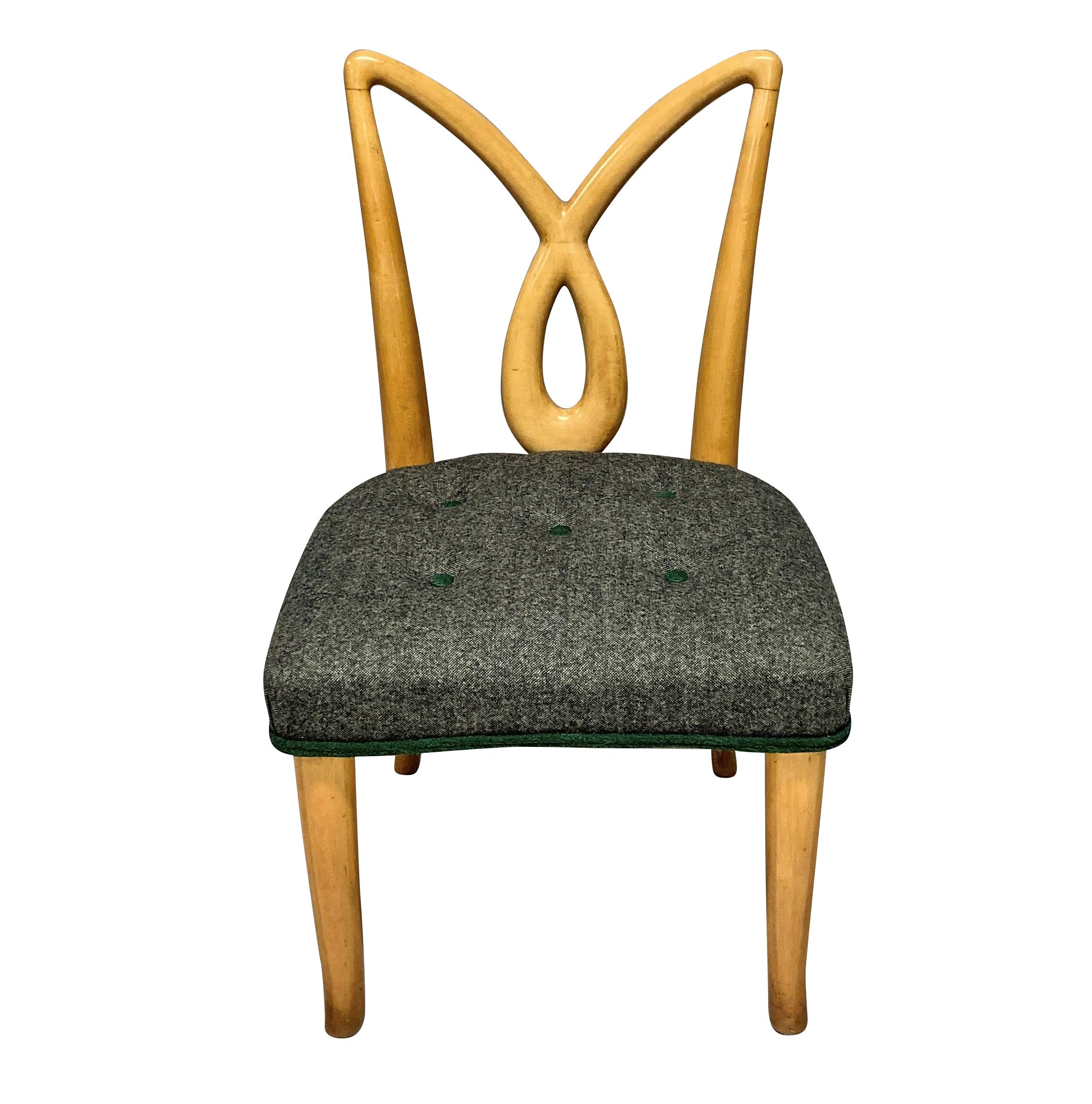 A pair of Italian mid-century hall chairs with sculptural backs, in lemon wood. The seats newly upholstered in grey wool with emerald green detailing.