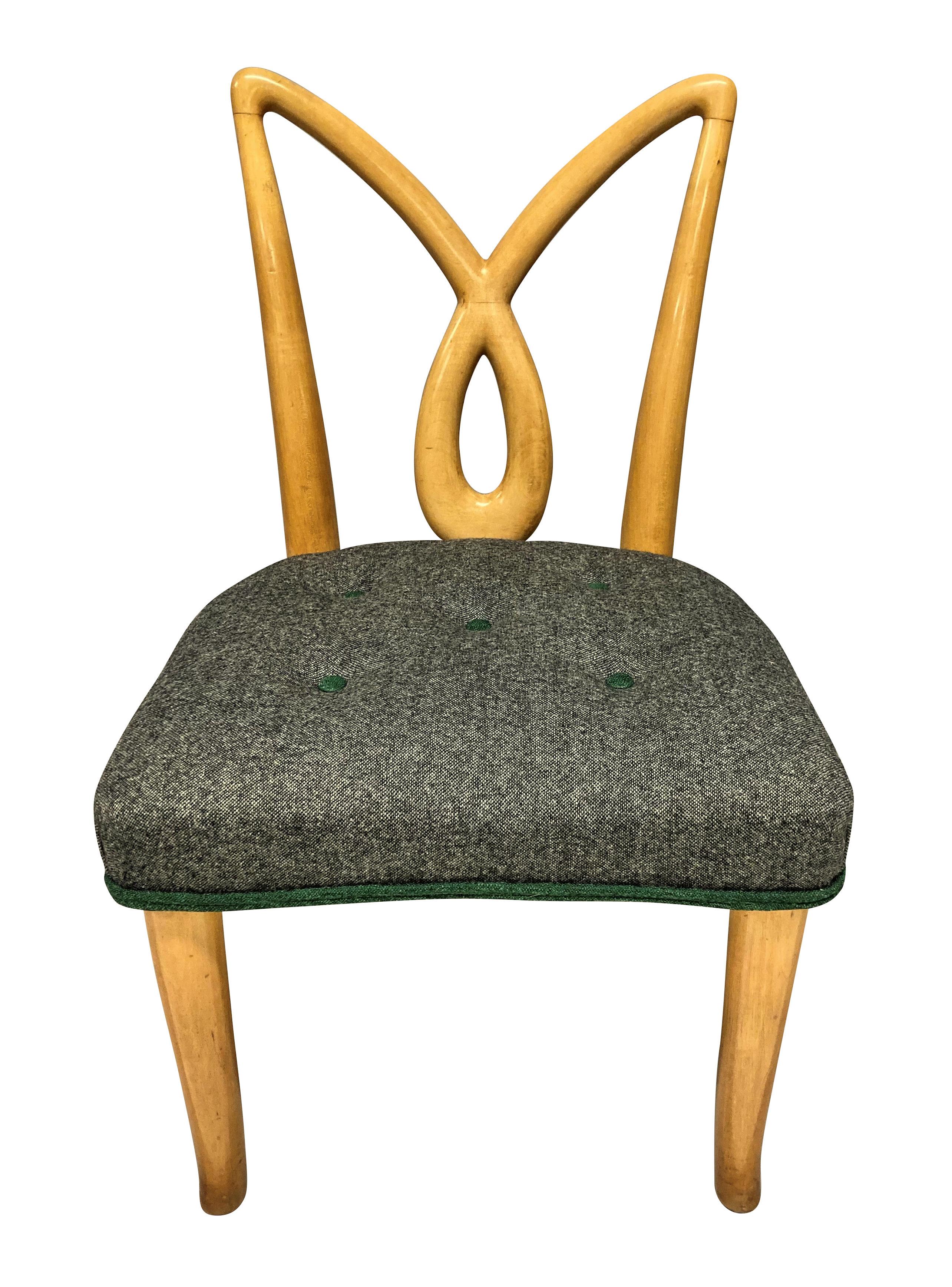 A pair of Italian mid-century hall chairs with sculptural backs, in lemon wood. The seats newly upholstered in grey wool with emerald green detailing.