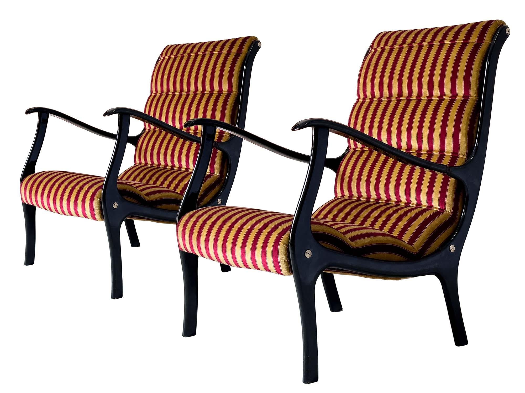 Stylish pair of Italian lounge chairs model ’MITZI’, well designed by Ezio Longhi for Elam in the 1950s.
The structures are in lacquered ebonized wood and the condition of the period are to be considered very good, with slight signs of wear