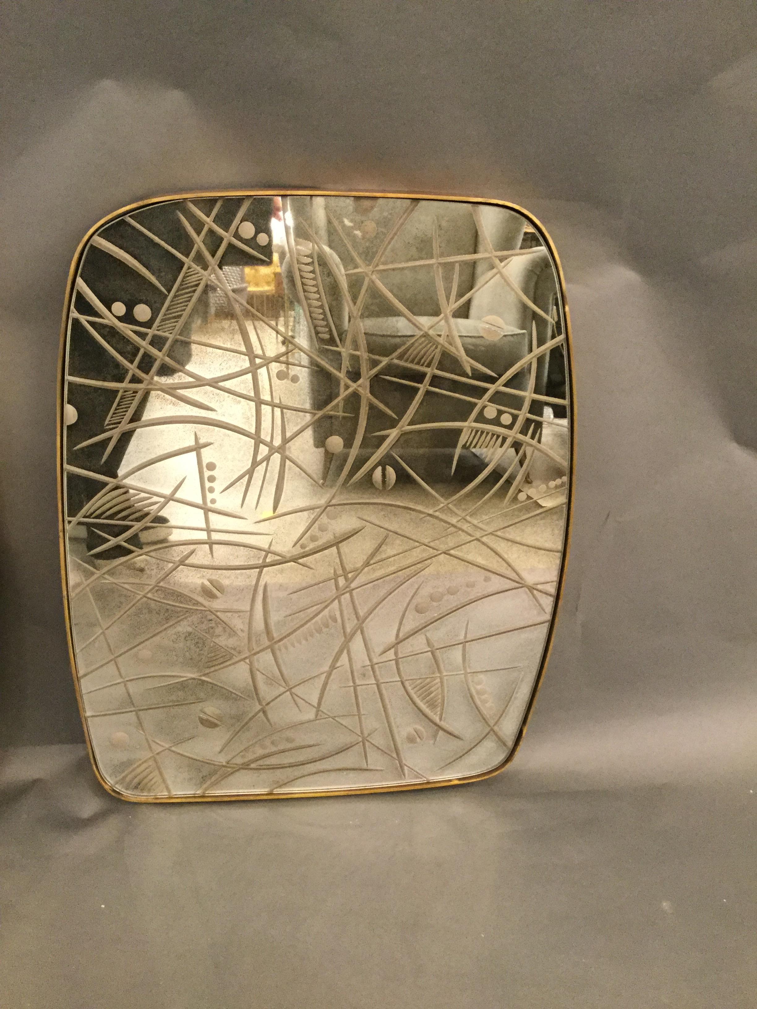 Pair of Italian mirrors with etched glass decorations and brass frame.