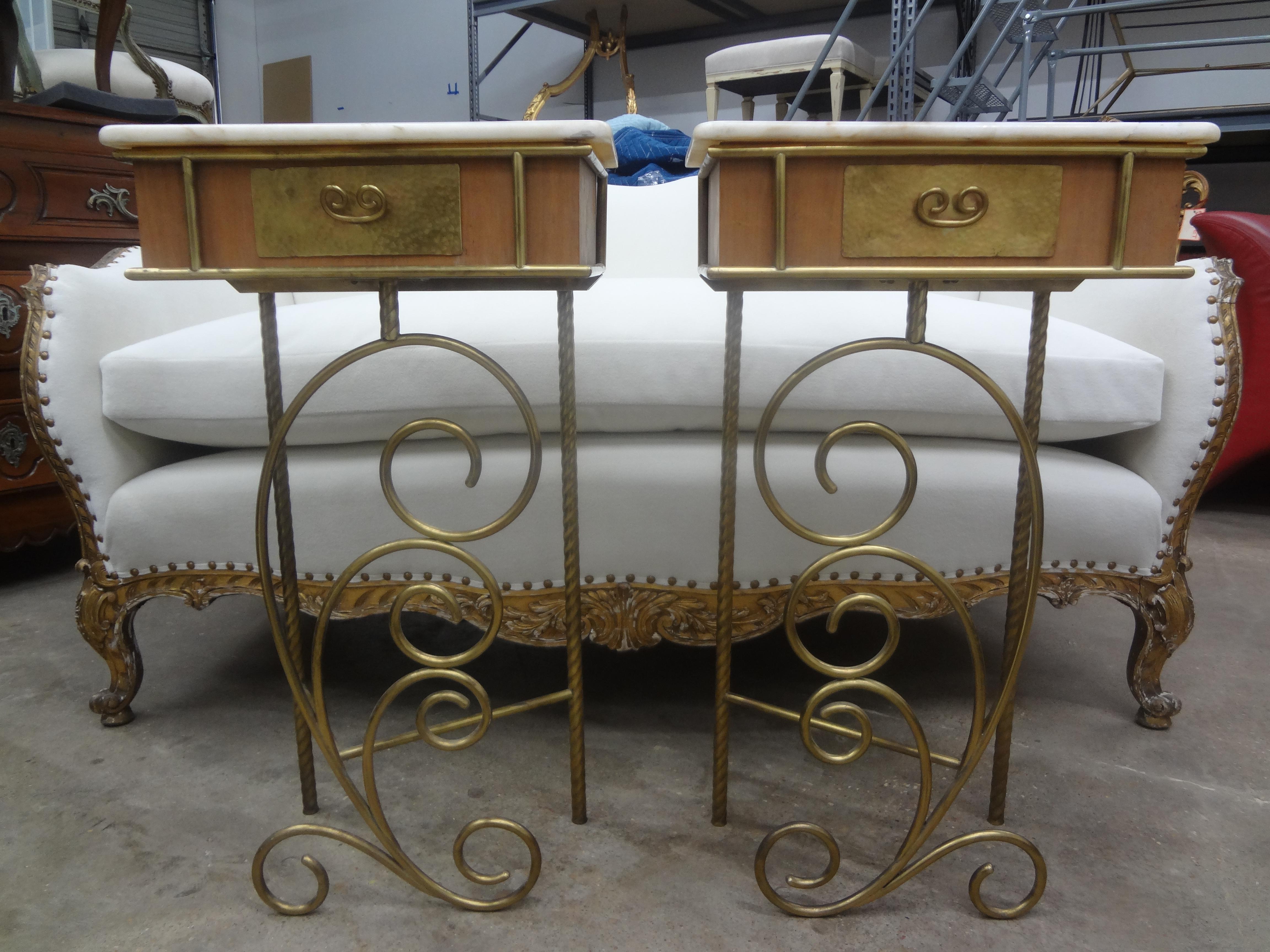Pair of Italian Modern brass nightstands or tables.
This unusual pair of Italian Gio Ponti style Mid-Century Modern brass night stands, bedside tables or side tables have an interesting design with a single drawer and marble tops.
Great Italian