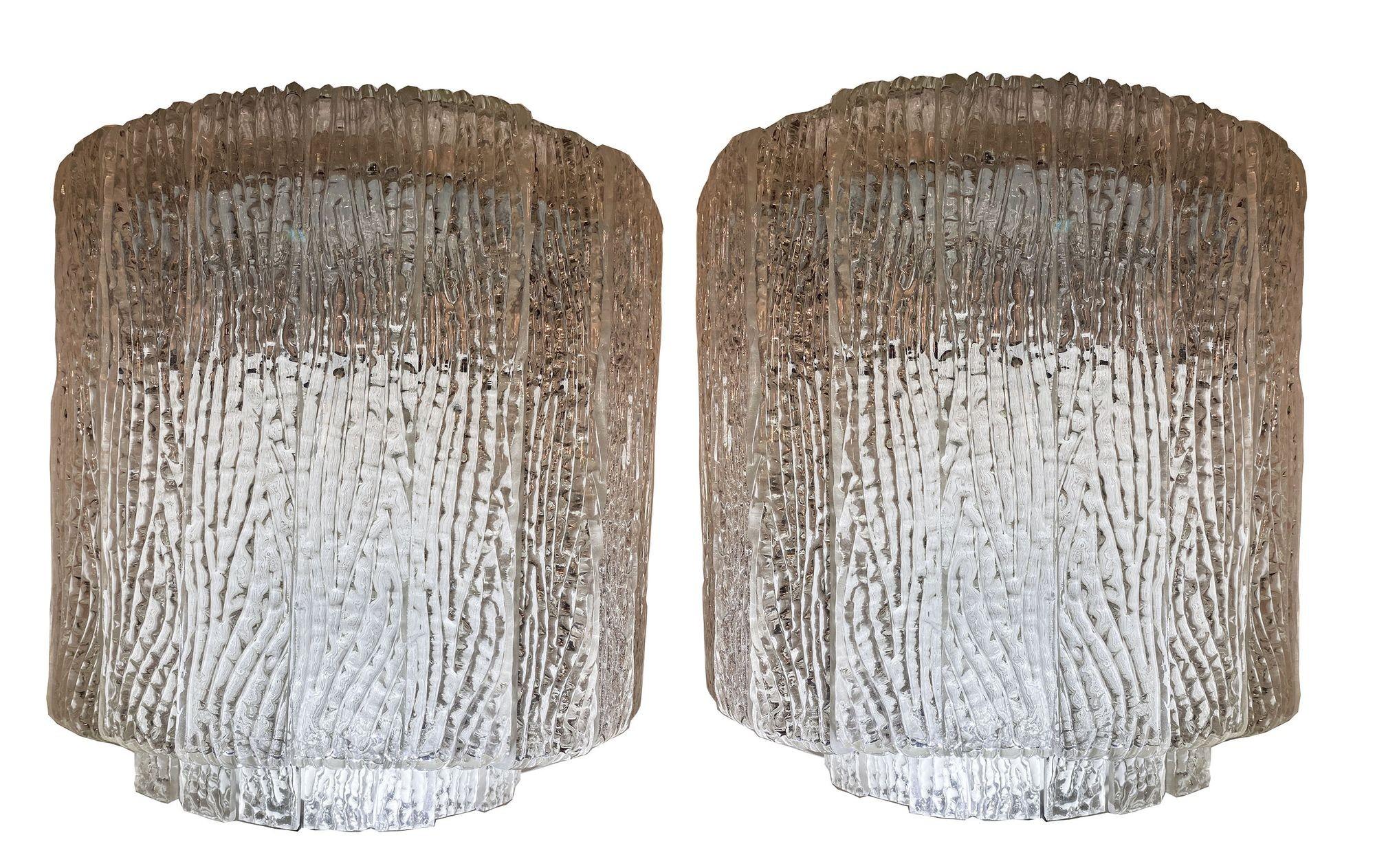 Pair of Italian Modern handblown glass sconces. Each with heavy mottled glass laid in semicircular form and in two tiers of glass.