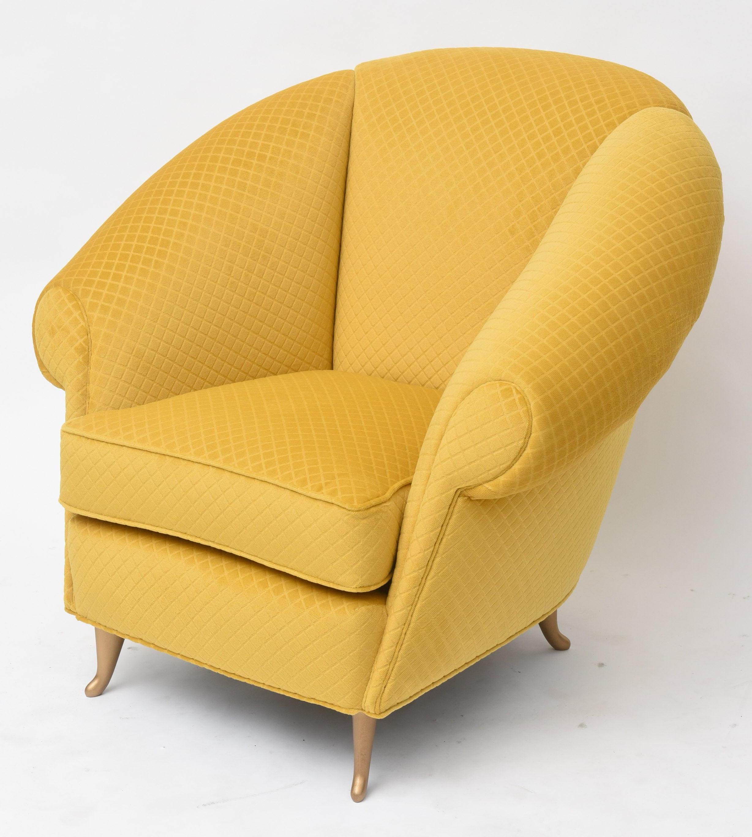 The rounded upholstered seat with rolled arms on brass curved legs, new upholstery.