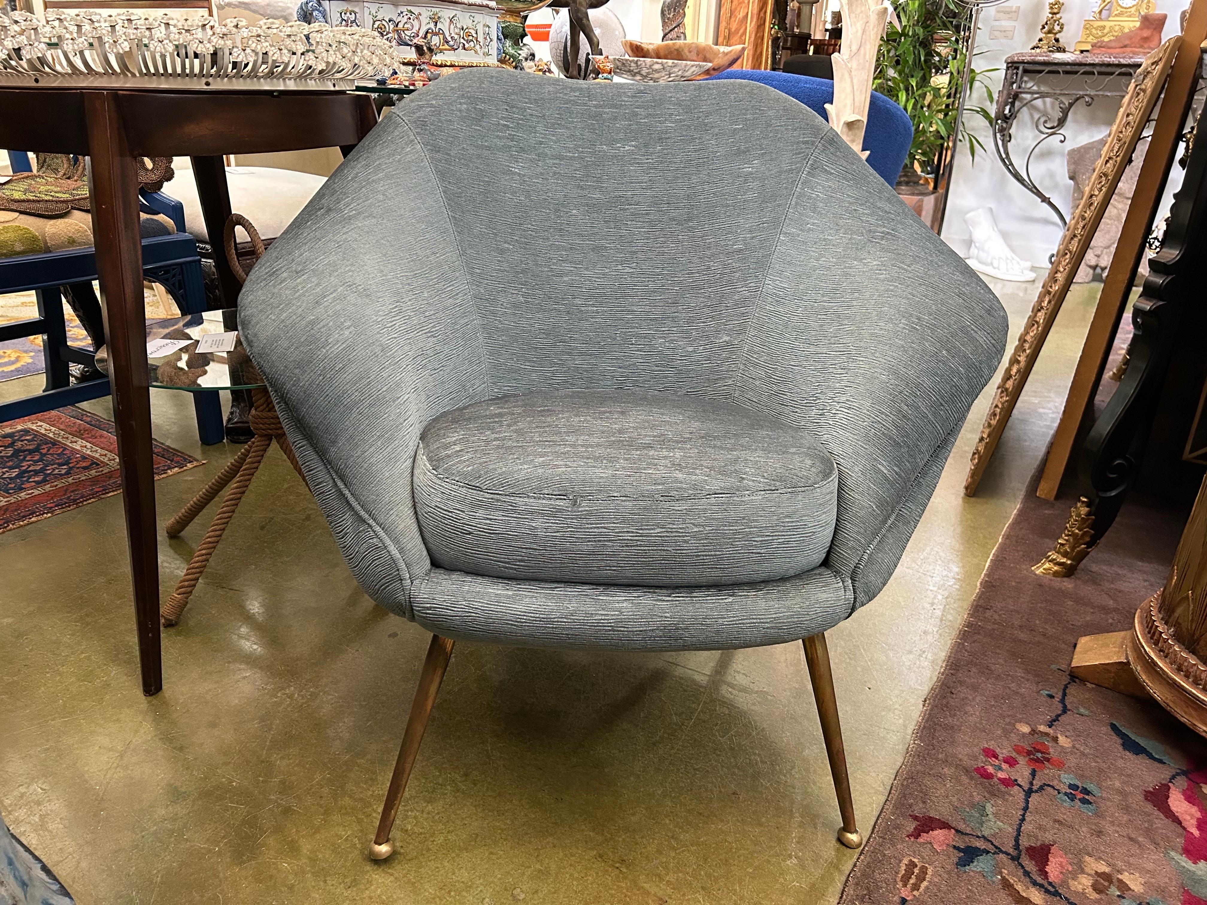 Pair Of Italian Modern Lounge Chairs In The Manner Of Gio Ponti.
Pair Of Italian Modern Sculptural Lounge Chairs Inspired By Gio Ponti.
This large pair of shapely Italian mid century lounge chairs have splayed brass legs, are of generous size and