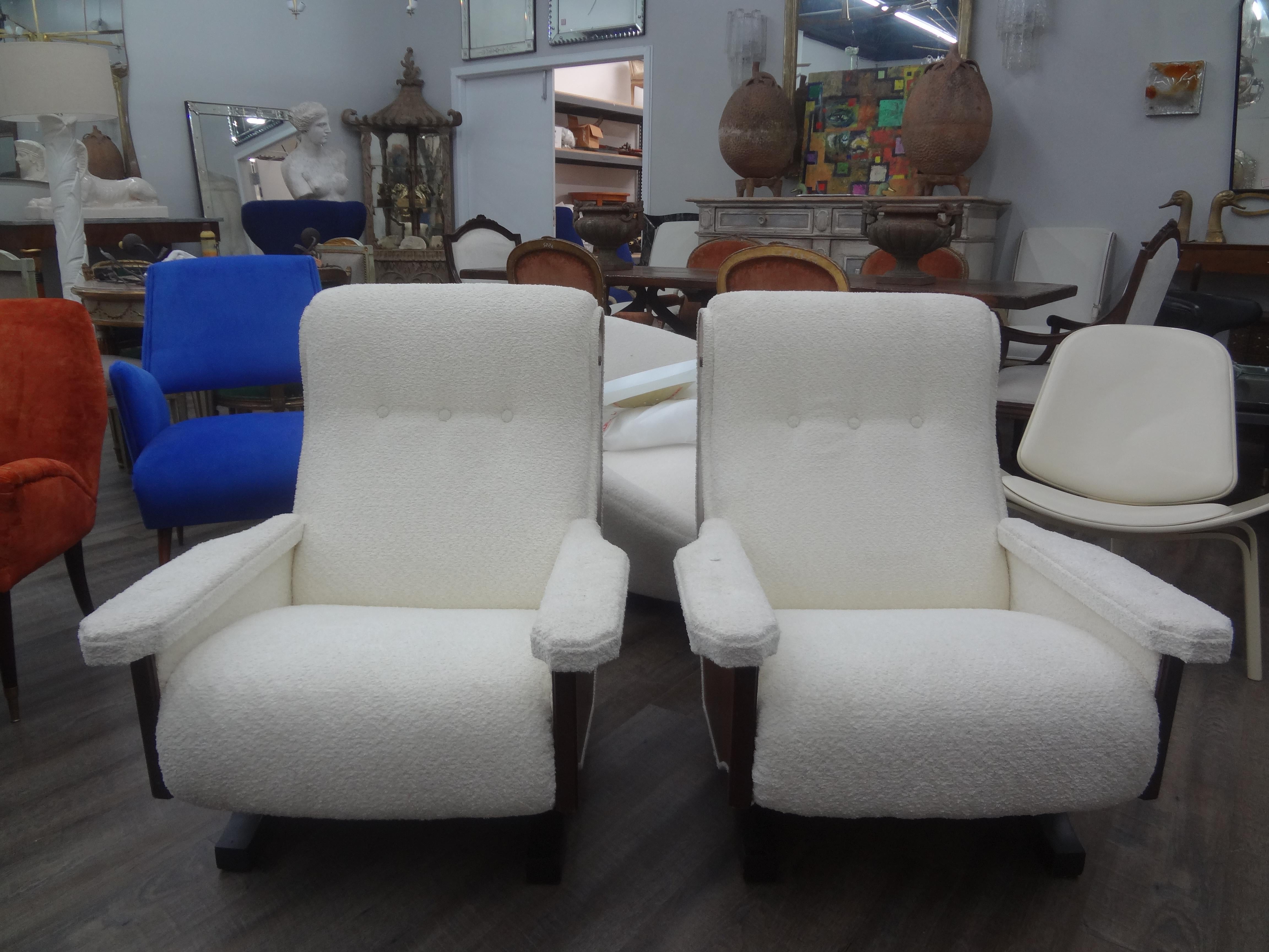 Pair Of Italian Modern Sculptural Lounge Chairs Inspired By Paolo Buffa.
This unusual pair of Italian mid century modern walnut lounge chairs are recently upholstered in white boucle fabric and are most comfortable.
Stunning from every angle!