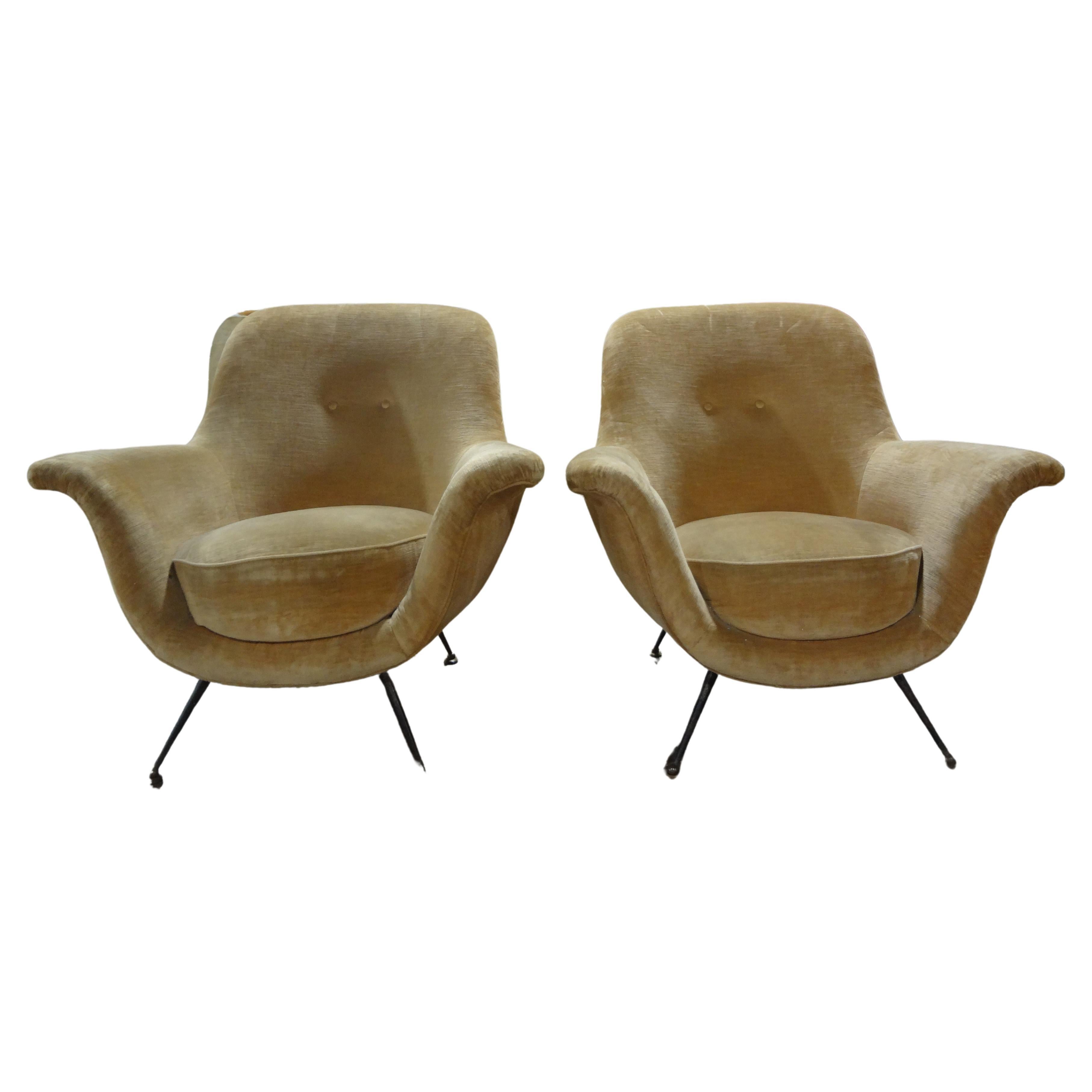 Pair Of Italian Modern Sculptural Lounge Chairs.
This lovely pair of mid century modern shapely lounge chairs, side chairs or occasional chairs with splayed legs are both stylish and comfortable. Upholstery is recent and usable or easily newly