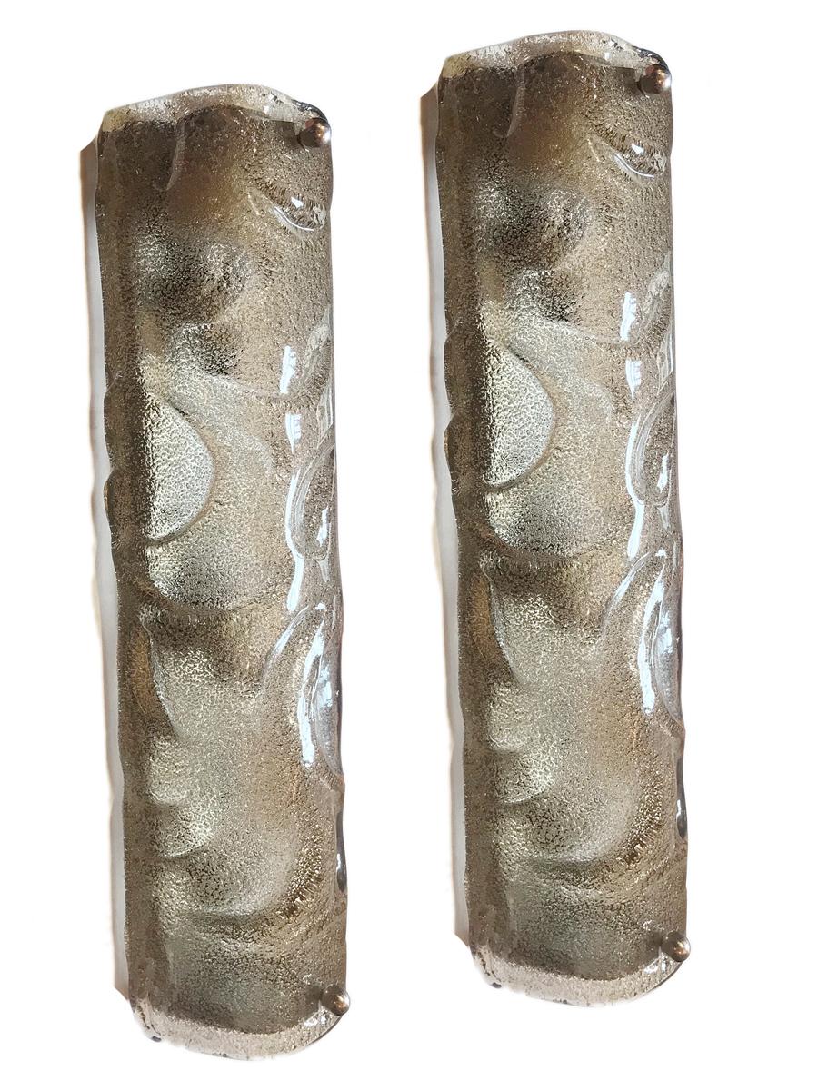 Pair of circa 1960s Italian texture-molded smoke-colored glass sconces with interior lights. 

Measurements:
Height 16