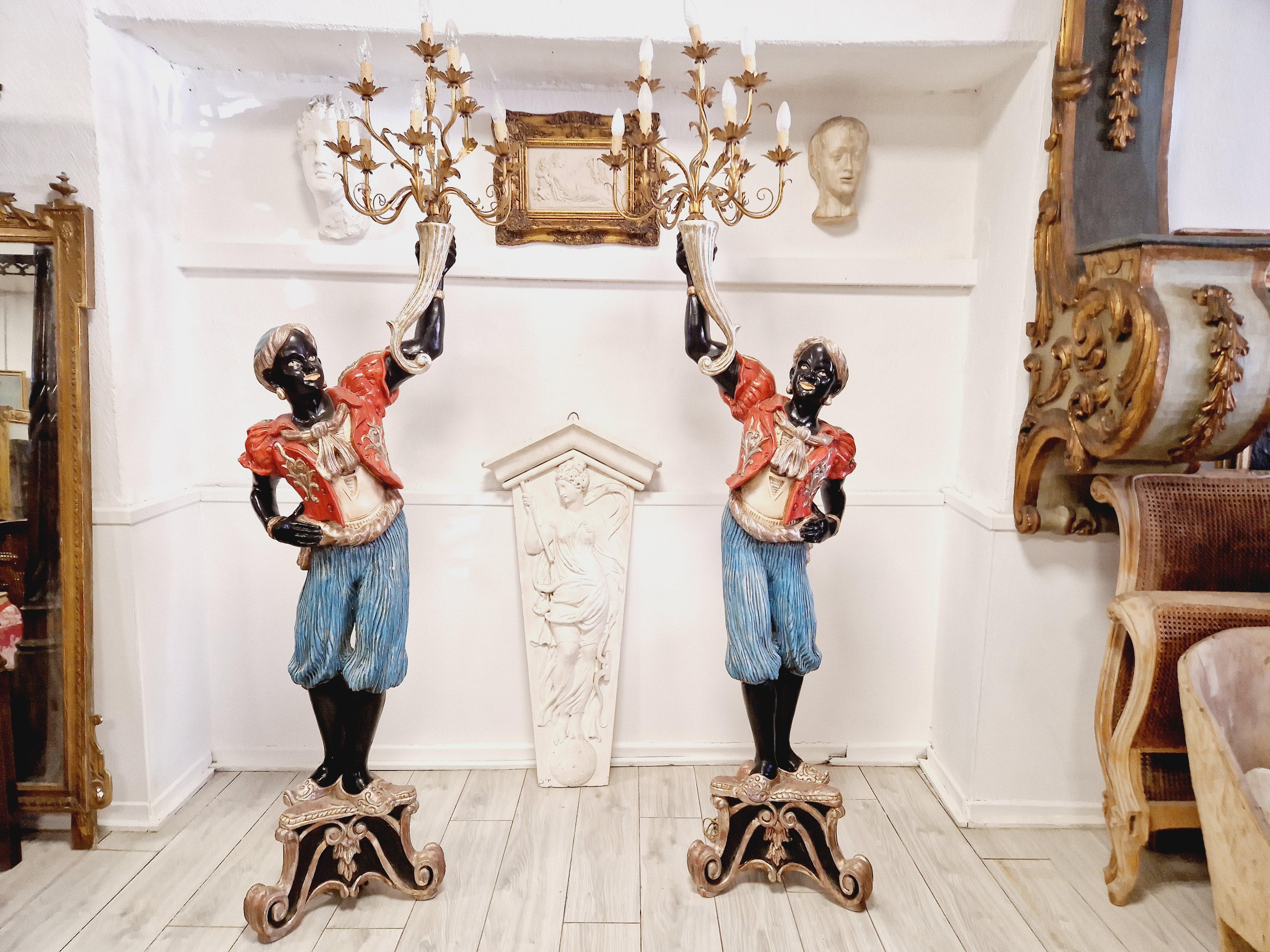 
Enhance your home's ambiance with these stunning Moor floor lamps! Beautifully crafted in Italy, these antique lamps are made of polychromed wood and feature a timeless design. The large size of these vintage lamps makes them a perfect addition to