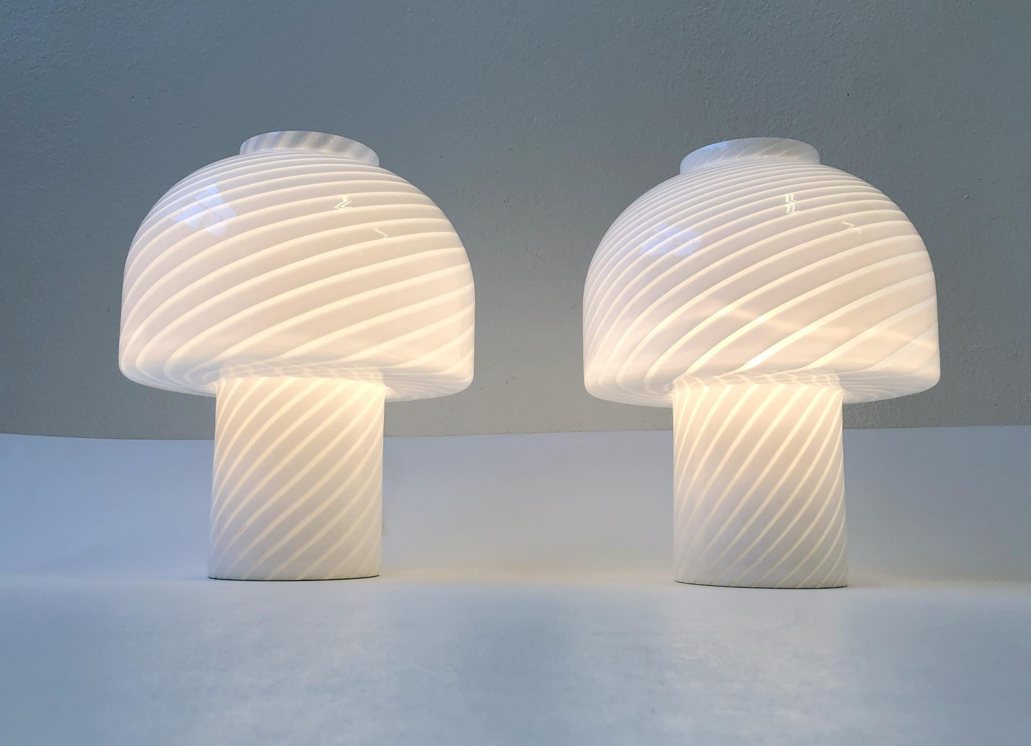 Pair of Italian Murano handblown glass table lamps design in the 1970s by Vetri Murano.
Dimensions: 13” diameter 16.5” high.