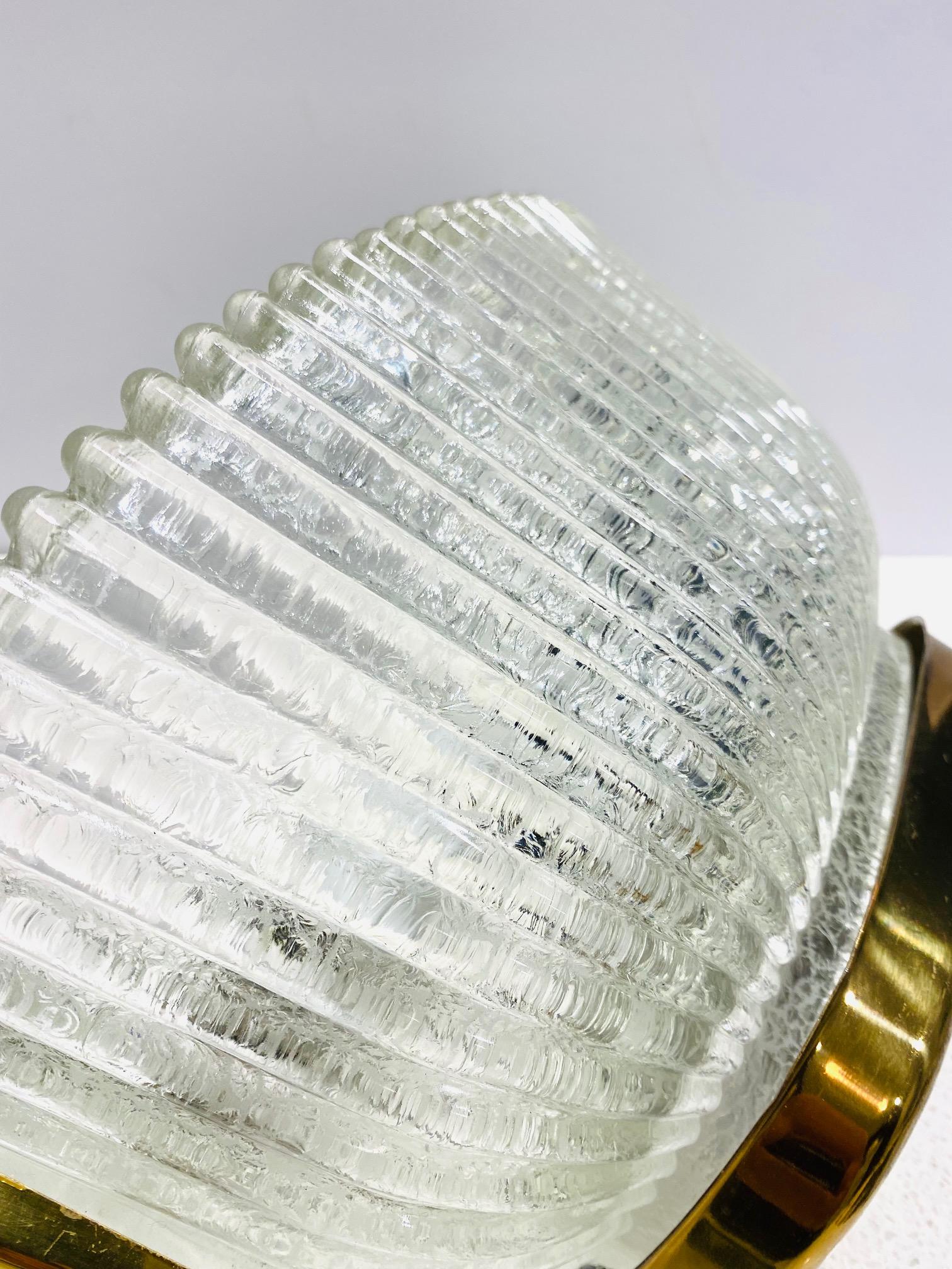 Mid-20th Century Pair of Seguso Murano Sconces with Fluted Glass and Brass Frames, circa 1940s