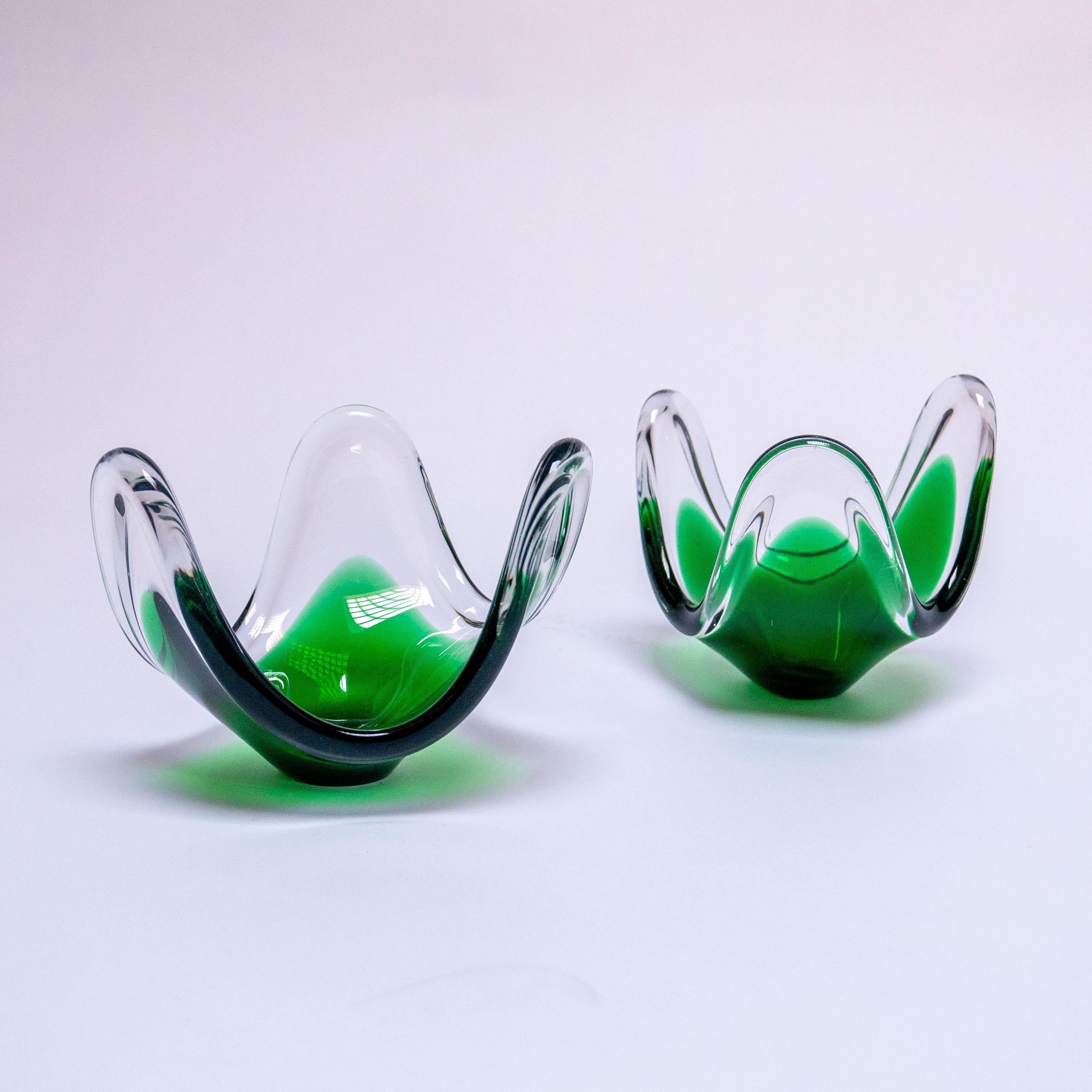 Showing all the beauty of Murano glass objects, with fluid shapes, vivid colors and a flawless, artisanal craftsmanship behind, these two sculptures give you endless decoration possibilities. They work great in a pair, have a personality big enough