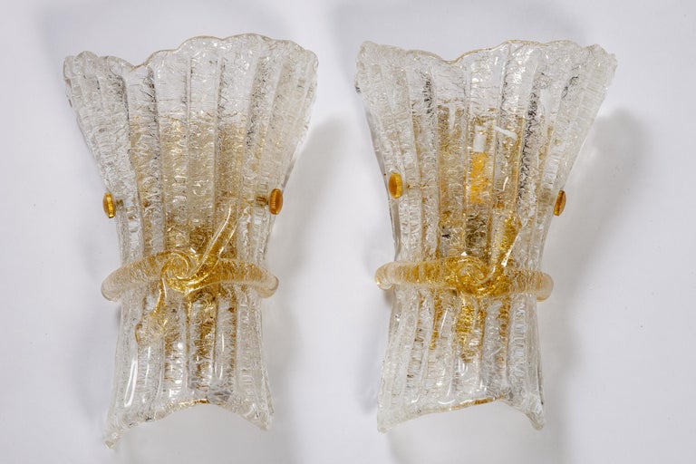 Pair of charming Murano glass sconces with brass fittings.
  