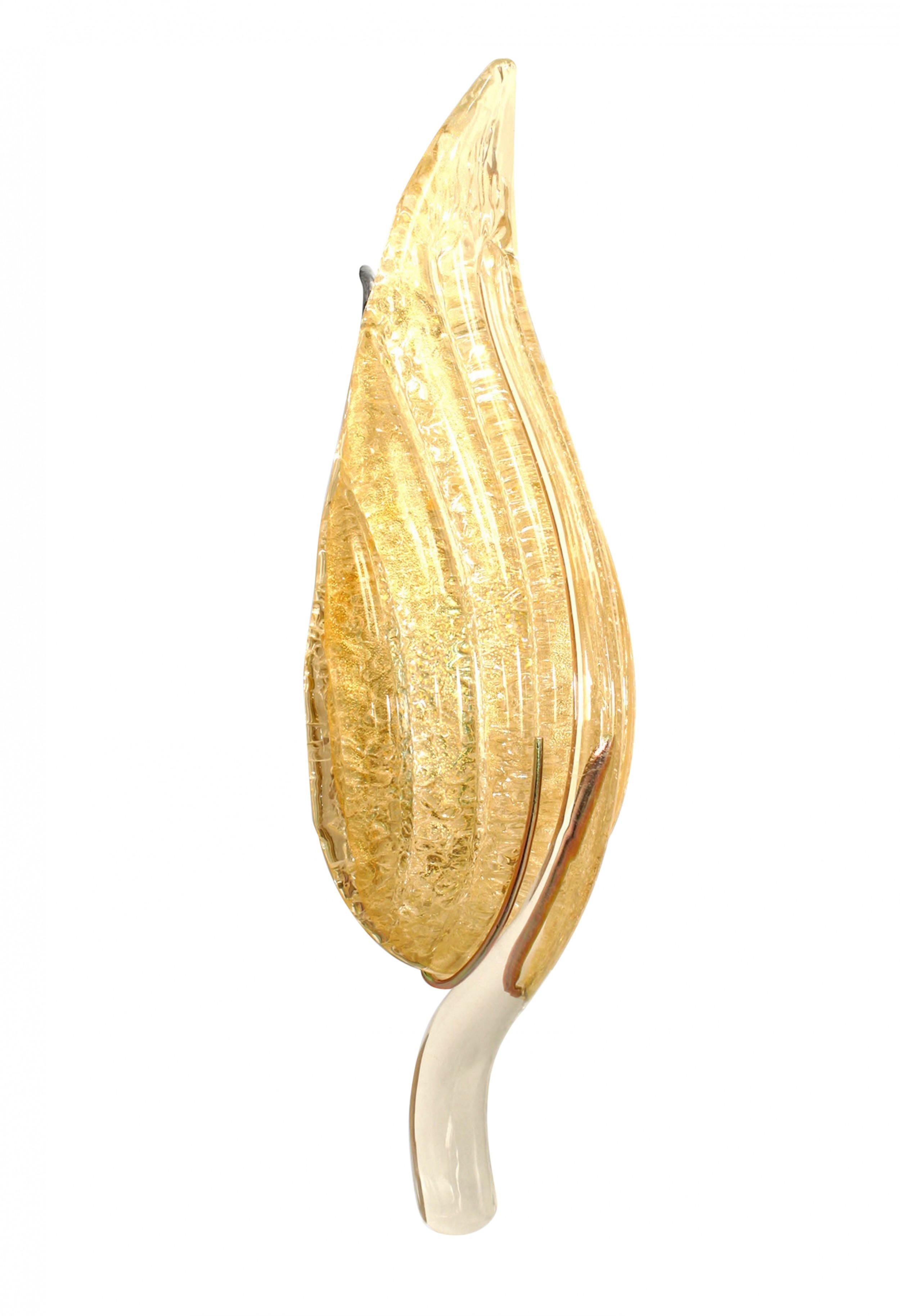 PAIR of Italian Murano-Style gold dusted glass wall sconces designed in the form of an acanthus leaf and supported with a silver metal bracket. (PRICED AS PAIR)