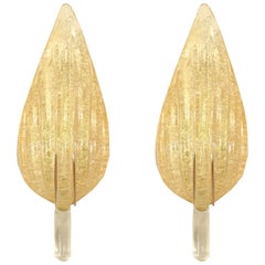 Coppia di applique italiane in vetro di Murano spolverato d'oro