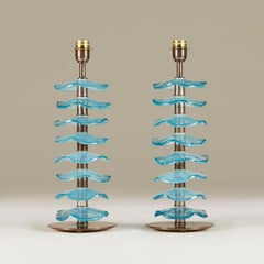 Pair of Italian Murano iridescent aquamarine petal lamps with brass detailing