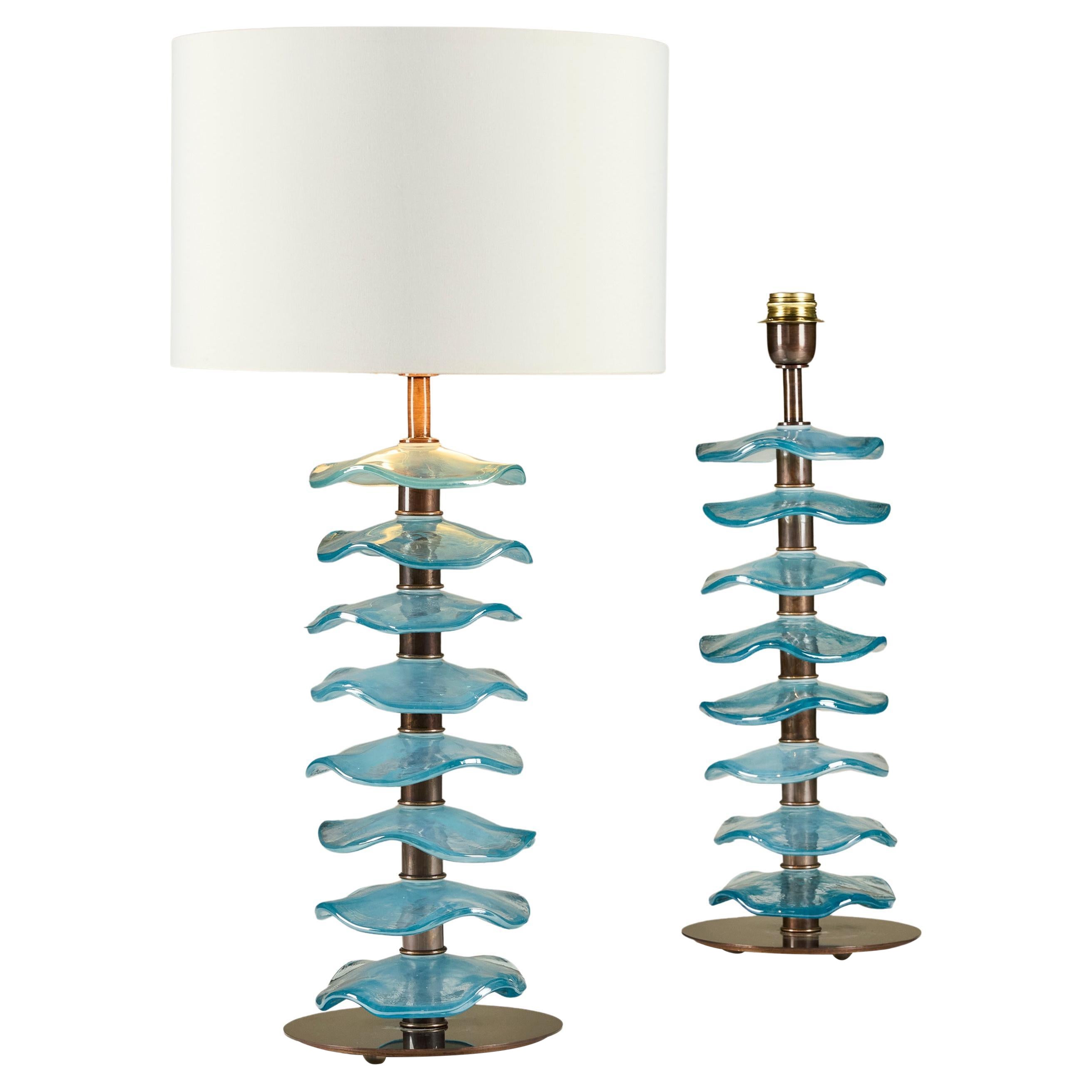 Pair of Italian Murano iridescent aquamarine petal lamps with brass detailing