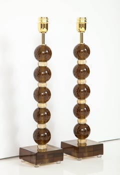 Paire de lampes sphériques italiennes en verre de Murano « Pulegoso » en bronze et or, signées