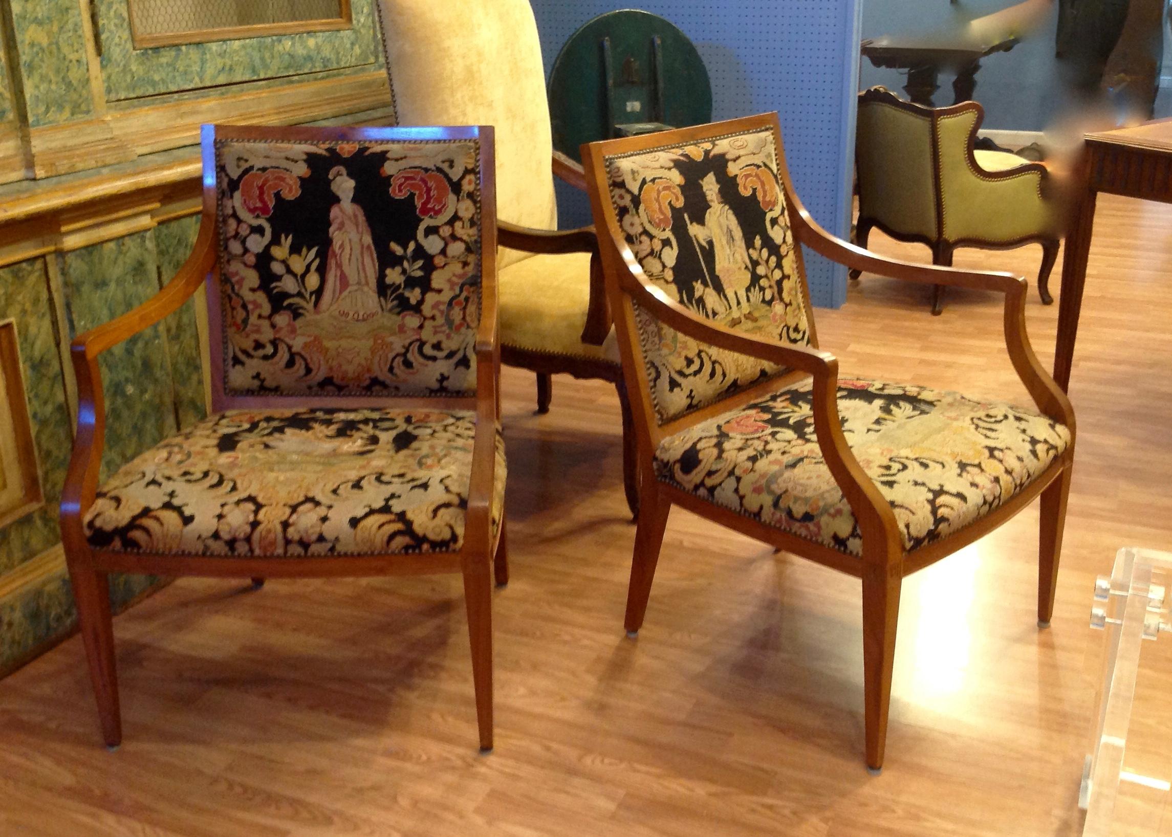 Fine fruitwood frames and dramatic original needlepoint seats and backrests.
The seats are appointed with dragons and the backs have opposing male and female figures.