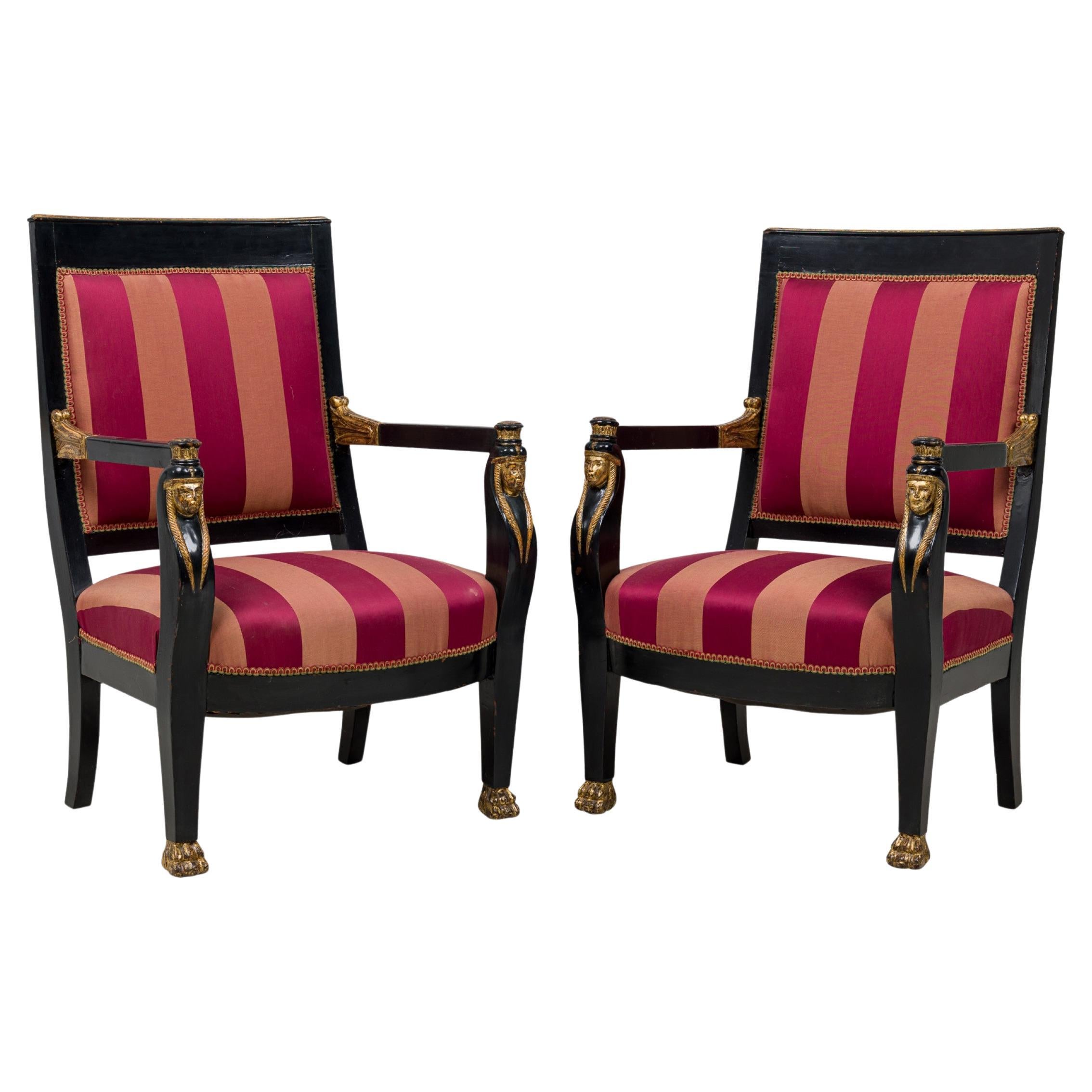 Pair of Italian Neo-Classic Ebonized and Parcel-Gilt Red Upholstered Armchairs For Sale