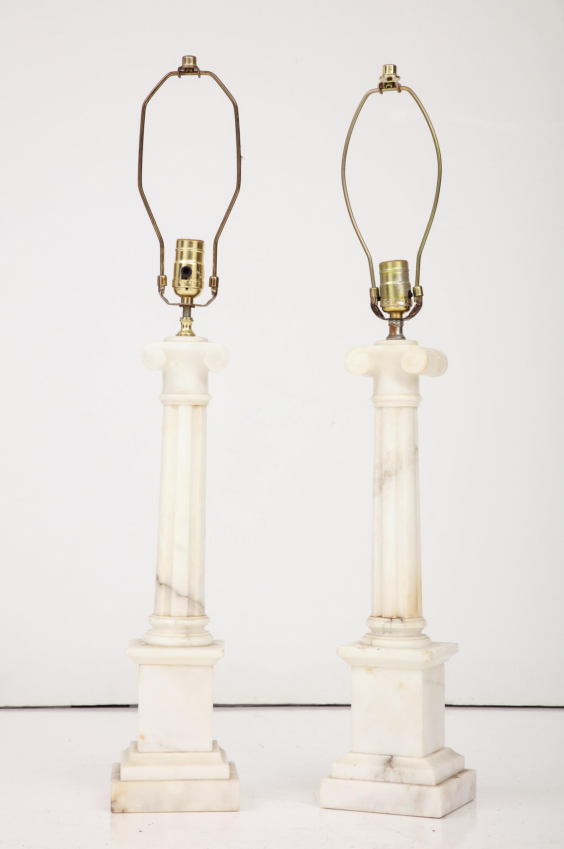 Pair of Italian Neo-classic Carrera marble column lamps. 
Column Height: 19