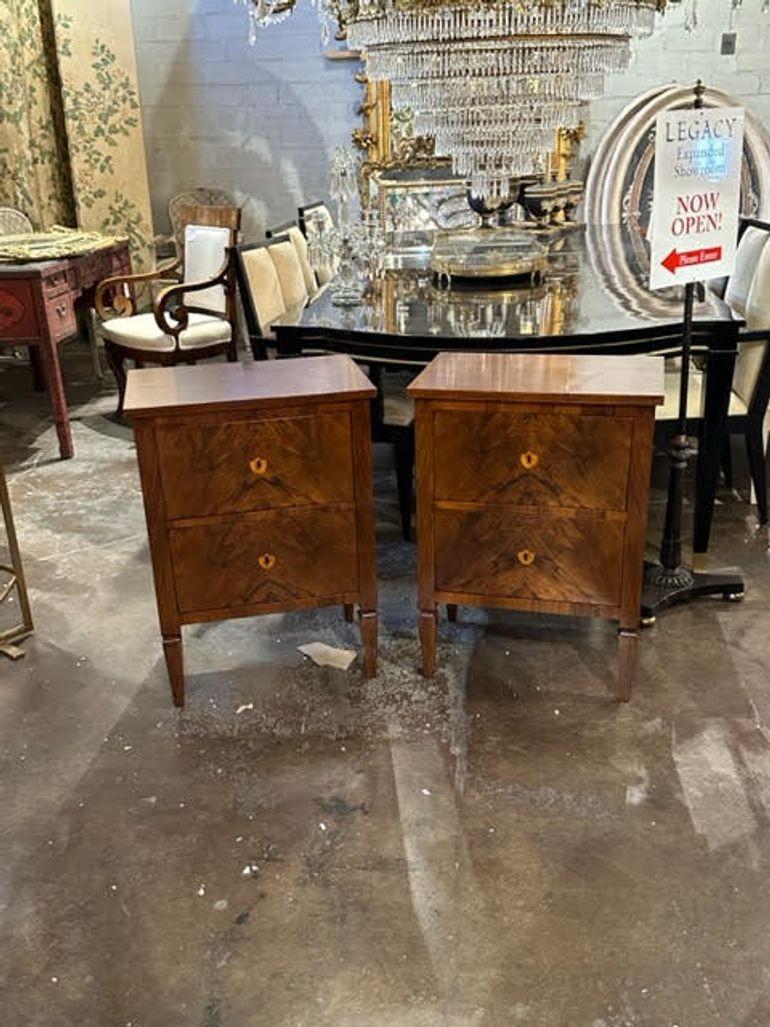 Very fine pair of Italian Neo-classical style side tables made of burl walnut. Featuring a gorgeous polished finish. A classic look for a fine home!
