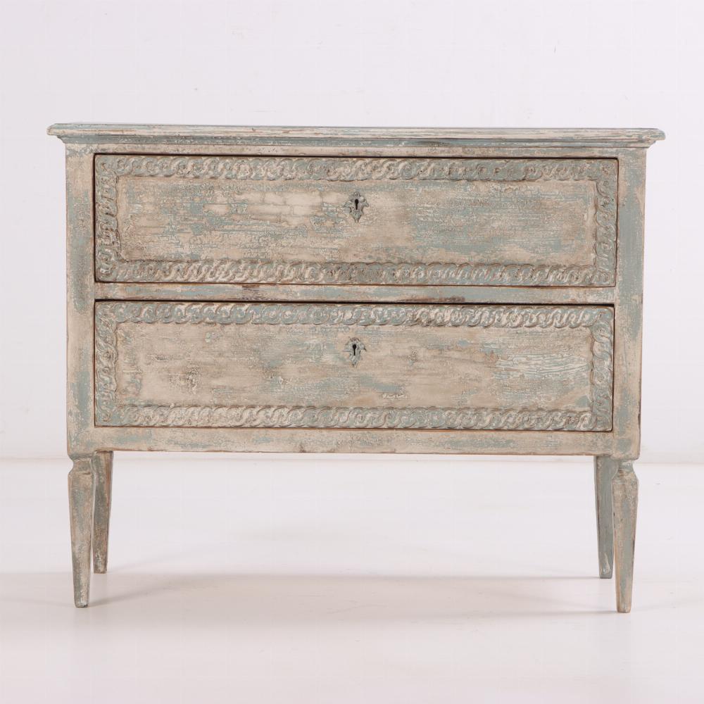 The pair each have two drawers with carved banding around the edges. The distressed painted finish make them perfect for your shabby chic interiors and give them texture although they basically serve as a neutral. They are in very good condition and