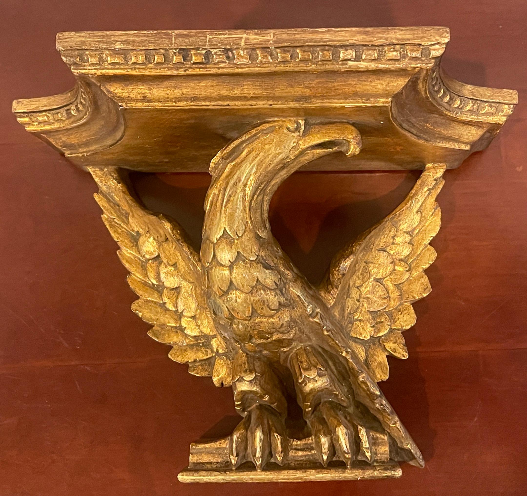 20th Century Pair of Italian Neoclassic Carved Giltwood Eagle Motif Wall Shelves For Sale