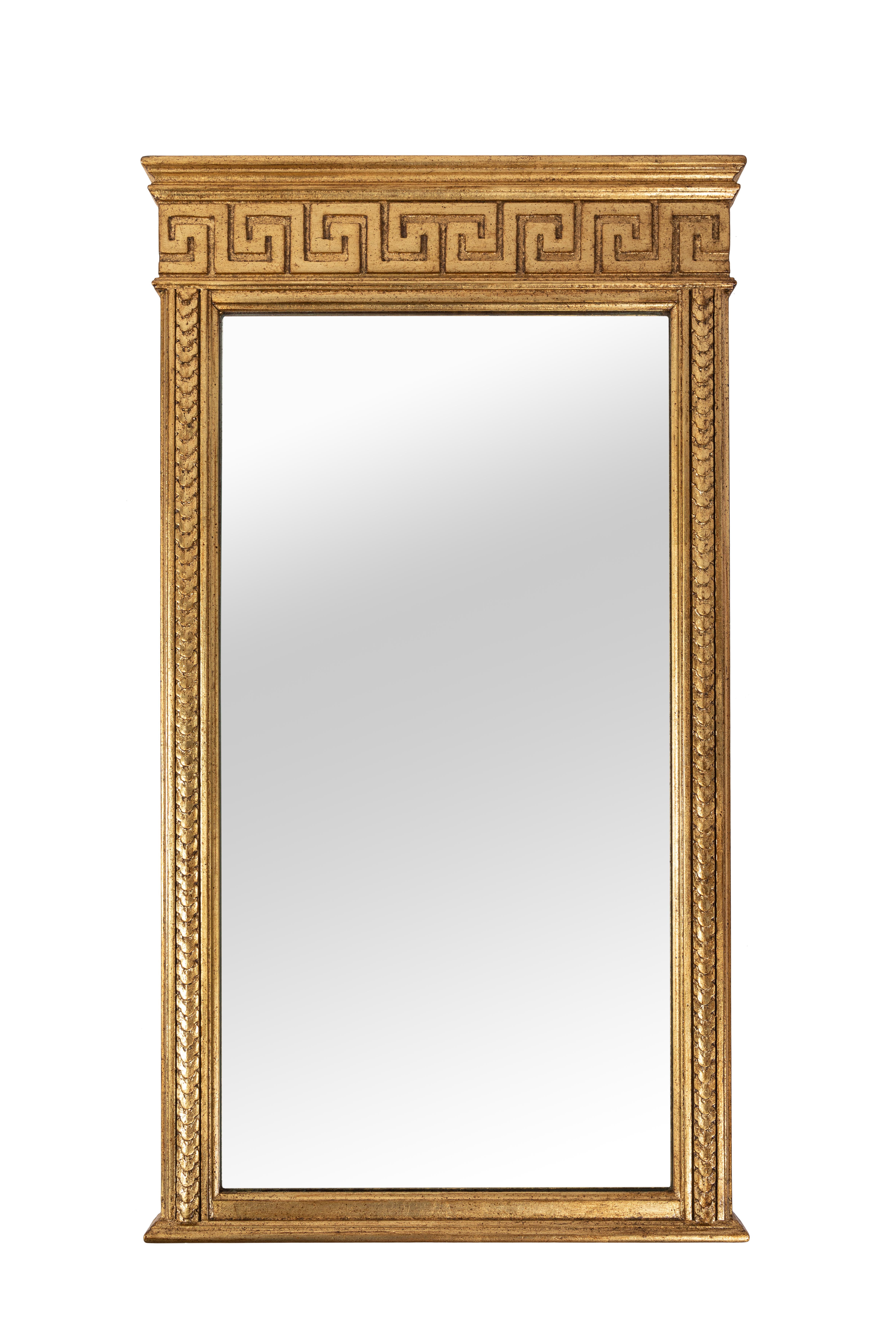 Beautiful pair of Italian neoclassic style giltwood mirrors with Greek key detailing. Wood with gilt finish. Marked 