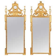 Coppia di specchi neoclassici italiani in legno dorato