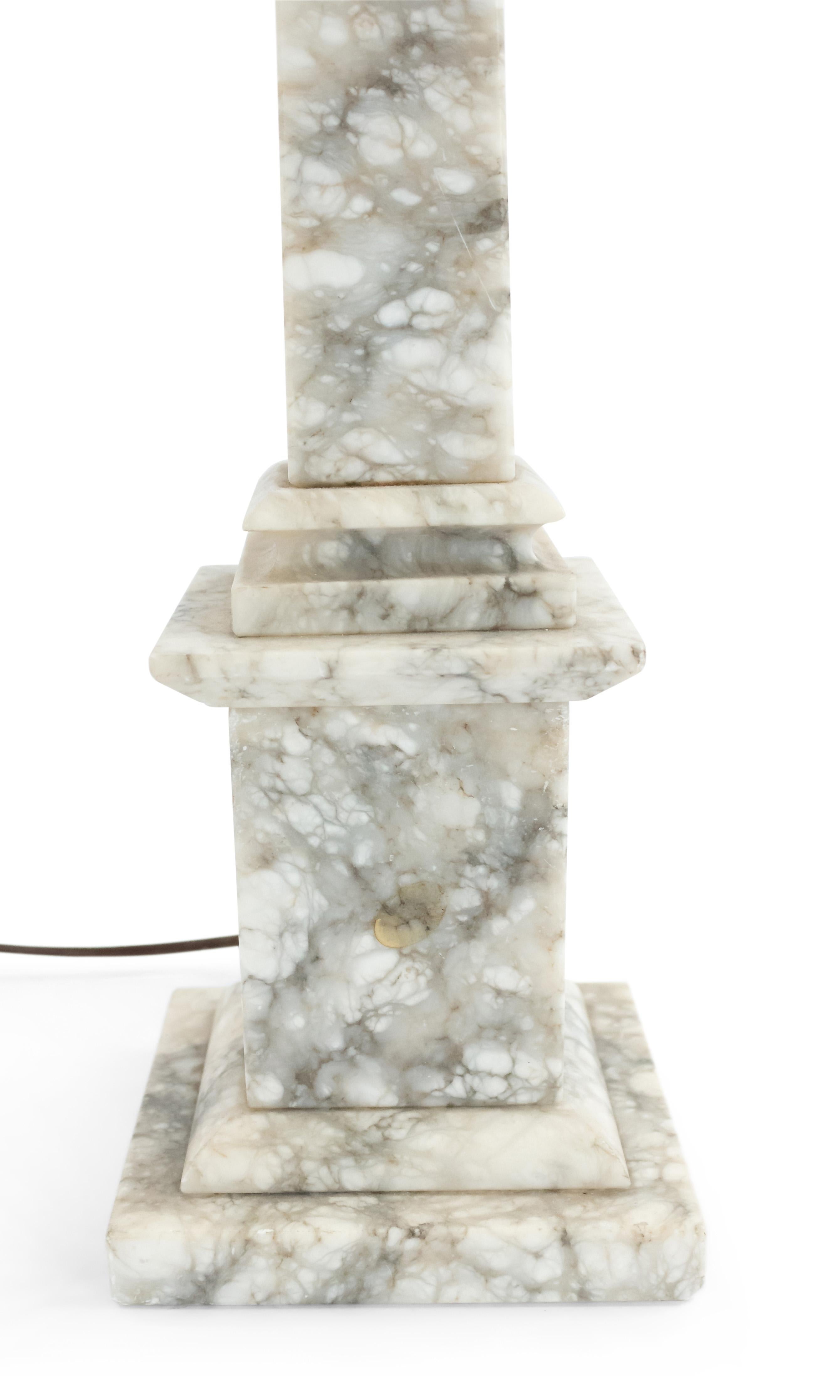 Pair of Italian neoclassic style (19th-20th century) veined white and gray marble table lamps.
 