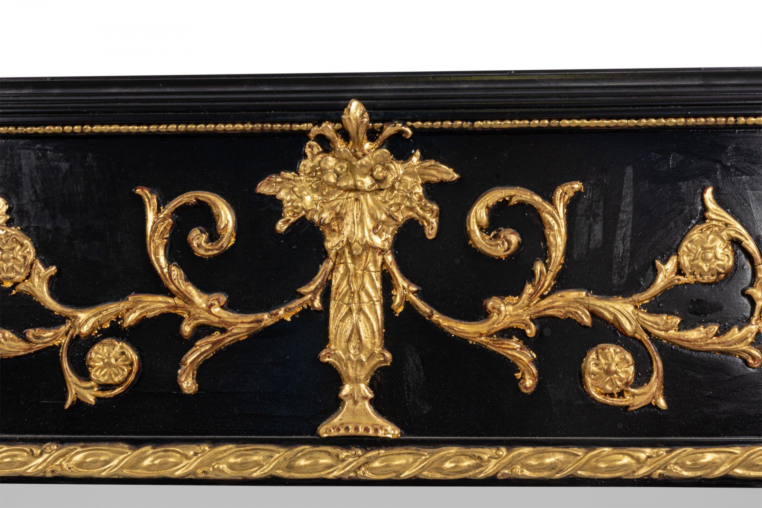 Pair of Italian neoclassic-style (20th Century) black lacquered vertical wall mirrors with carved gilt swag and scroll design with an inner gilt beaded trim.