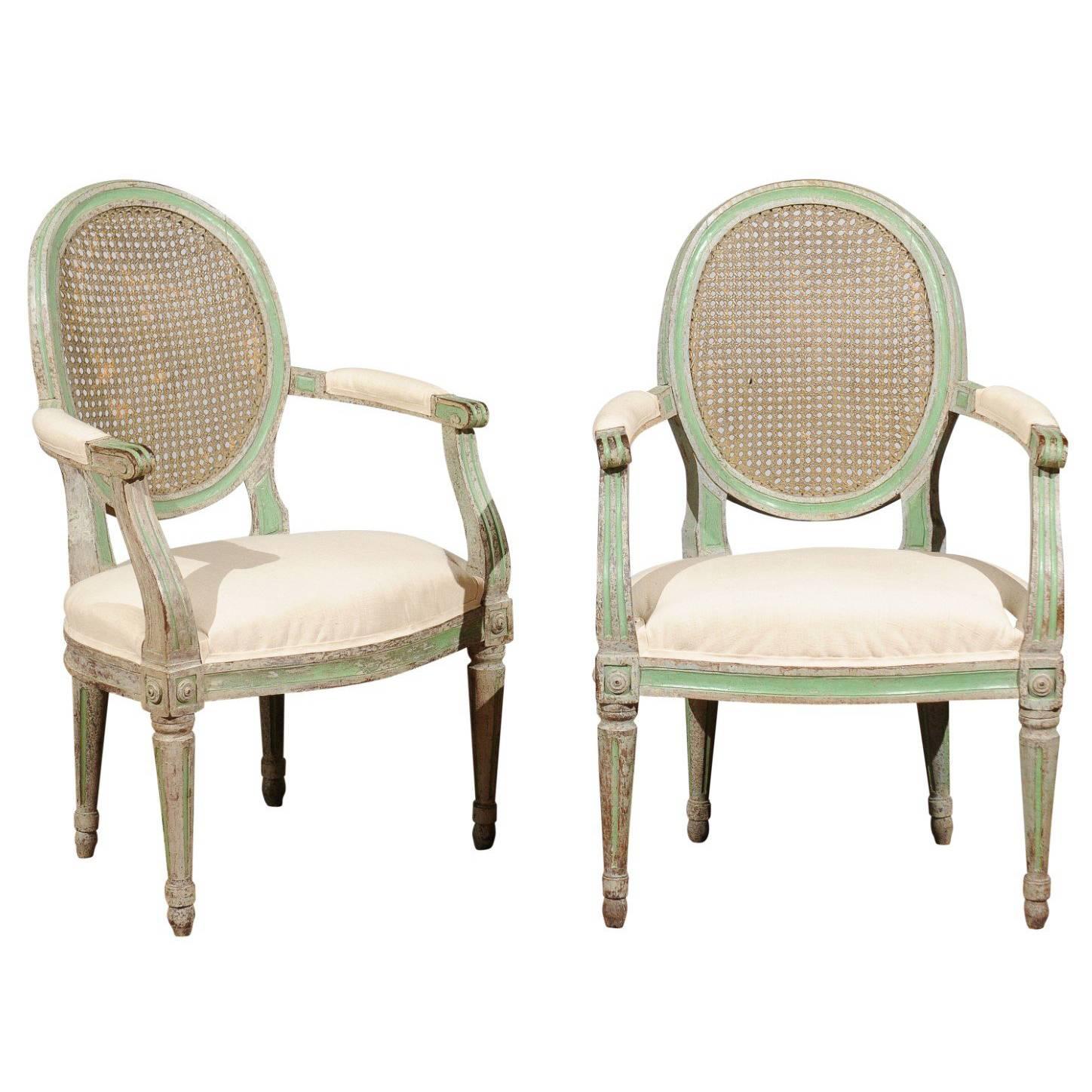 Pair of Italian Neoclassical 1850s Green Painted Armchairs with Cane Oval Backs