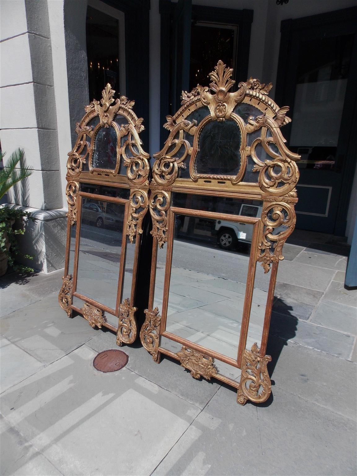 Early 19th Century Pair of Italian Neoclassical Gilt Carved Wood Foliage Crest Mirrors, Circa 1810