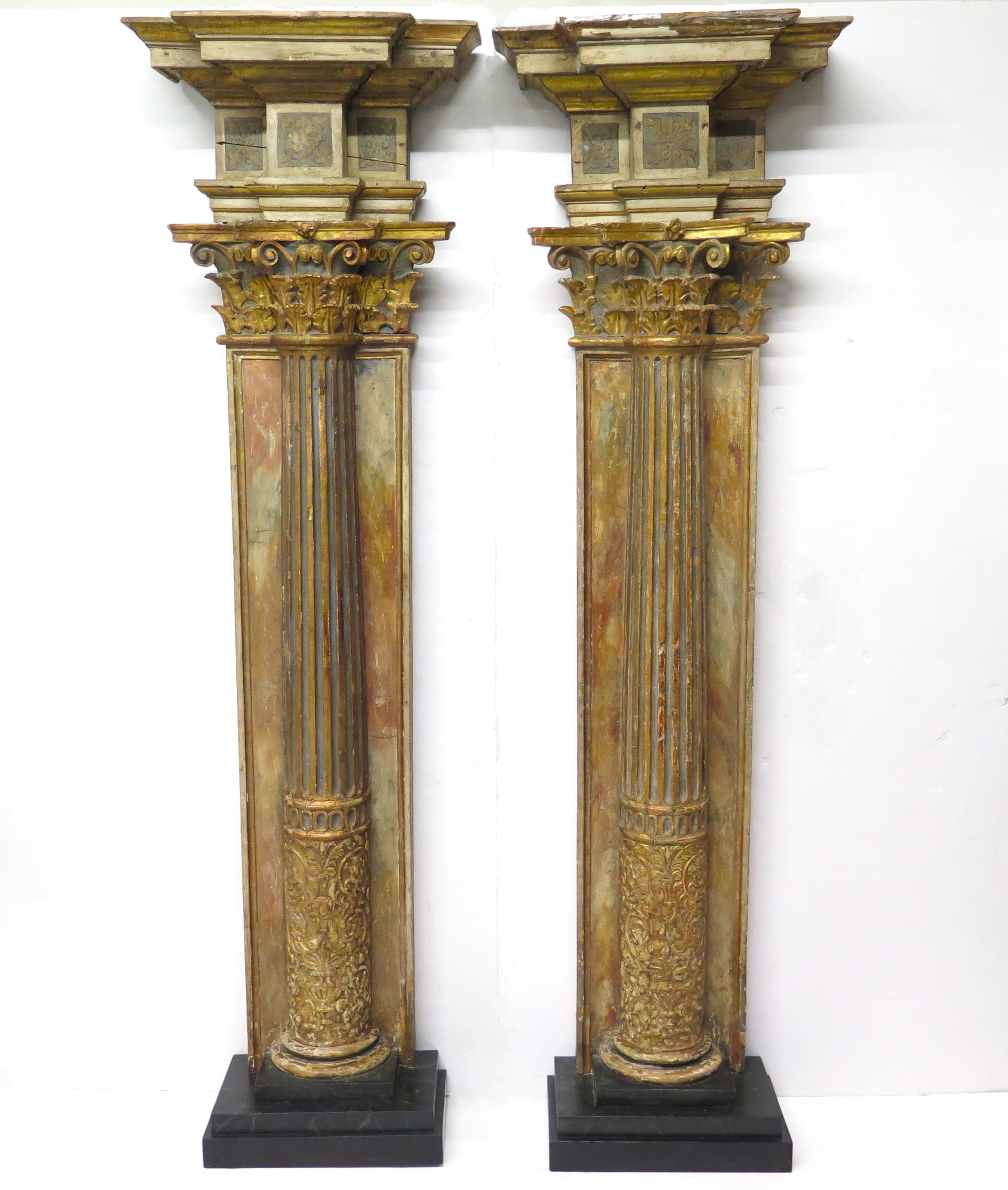 a pair of Neoclassical giltwood and polychrome decorated fluted Corinthian three quarter columns / architectural elements, Italy, early 19th century

93.25
