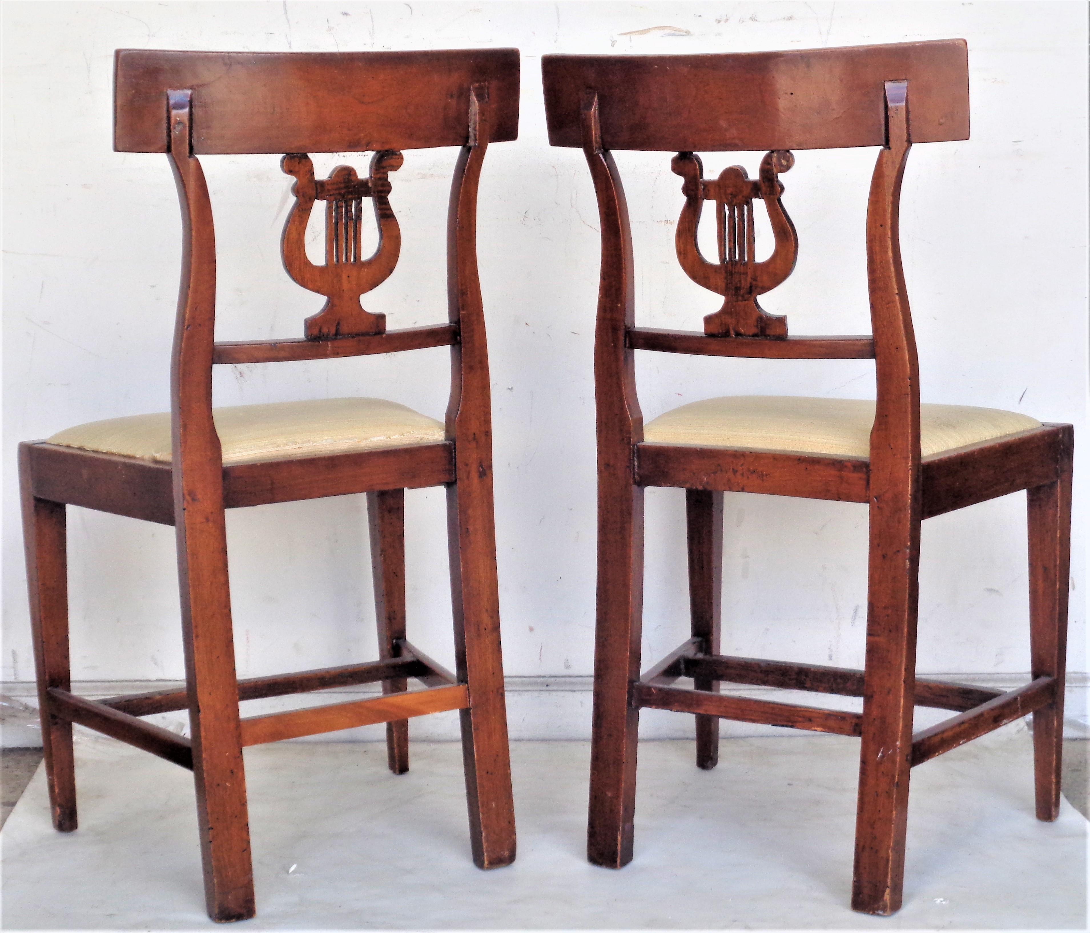 vintage harp back chairs