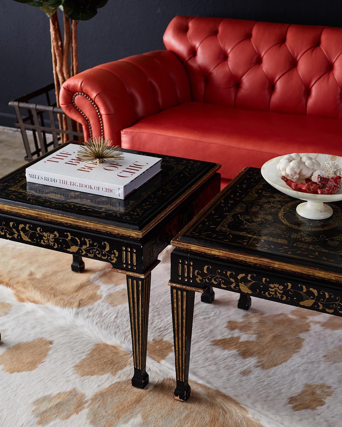 Lavish pair of Italian parcel gilt lacquered drinks tables or side tables made in the neoclassical taste. Featuring an old world style lacquer finish with intentional craquelure and distressing. The tops and each side are decorated with hand-painted
