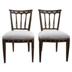 Pair of Italian Neoclassical Style Painted and Giltwood Chairs