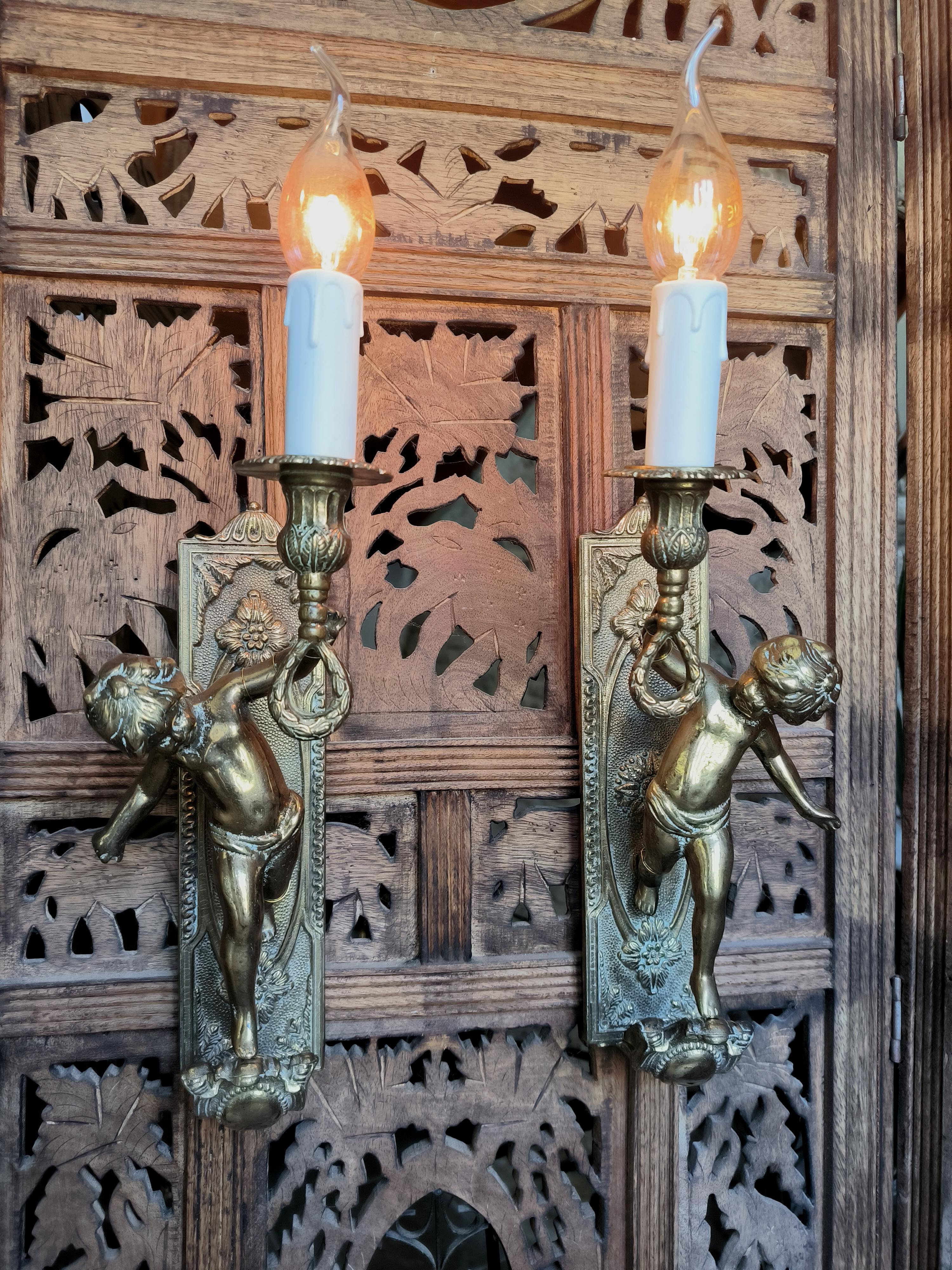 Pair of Italian, Neoclassical style, solid bronze Cherub sconces. Circa 1950s 4