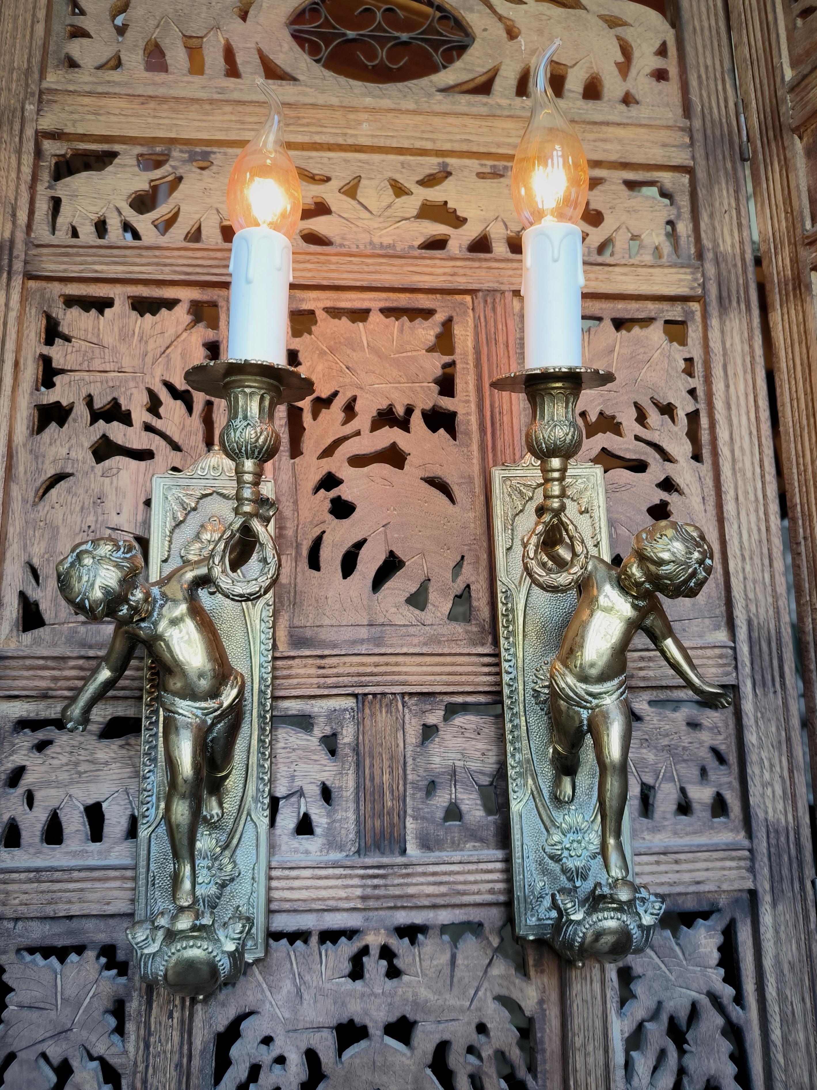 Pair of Italian, Neoclassical style, solid bronze Cherub sconces. Circa 1950s 3