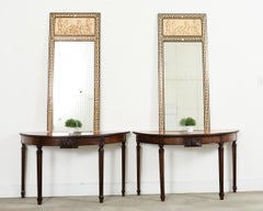 Pair of Italian Neoclassical Walnut Apollo Sunburst Demilunes